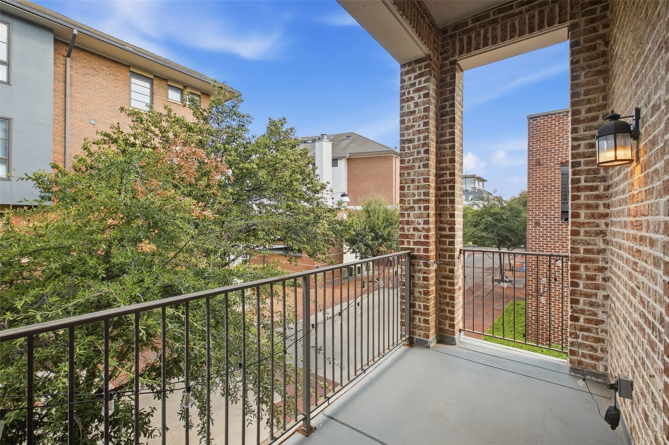 Step out to a covered balcony off the kitchen for morning coffee at treetop level