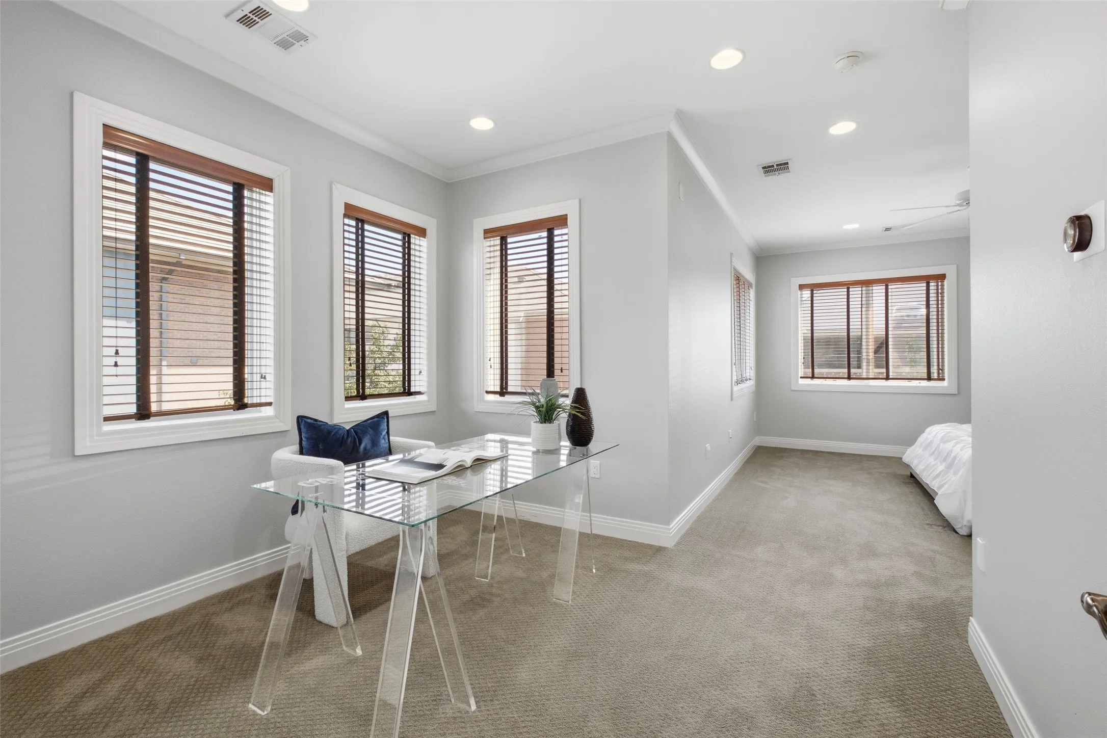 The primary suite is big enough to carve out a sitting area and still feel wide open
