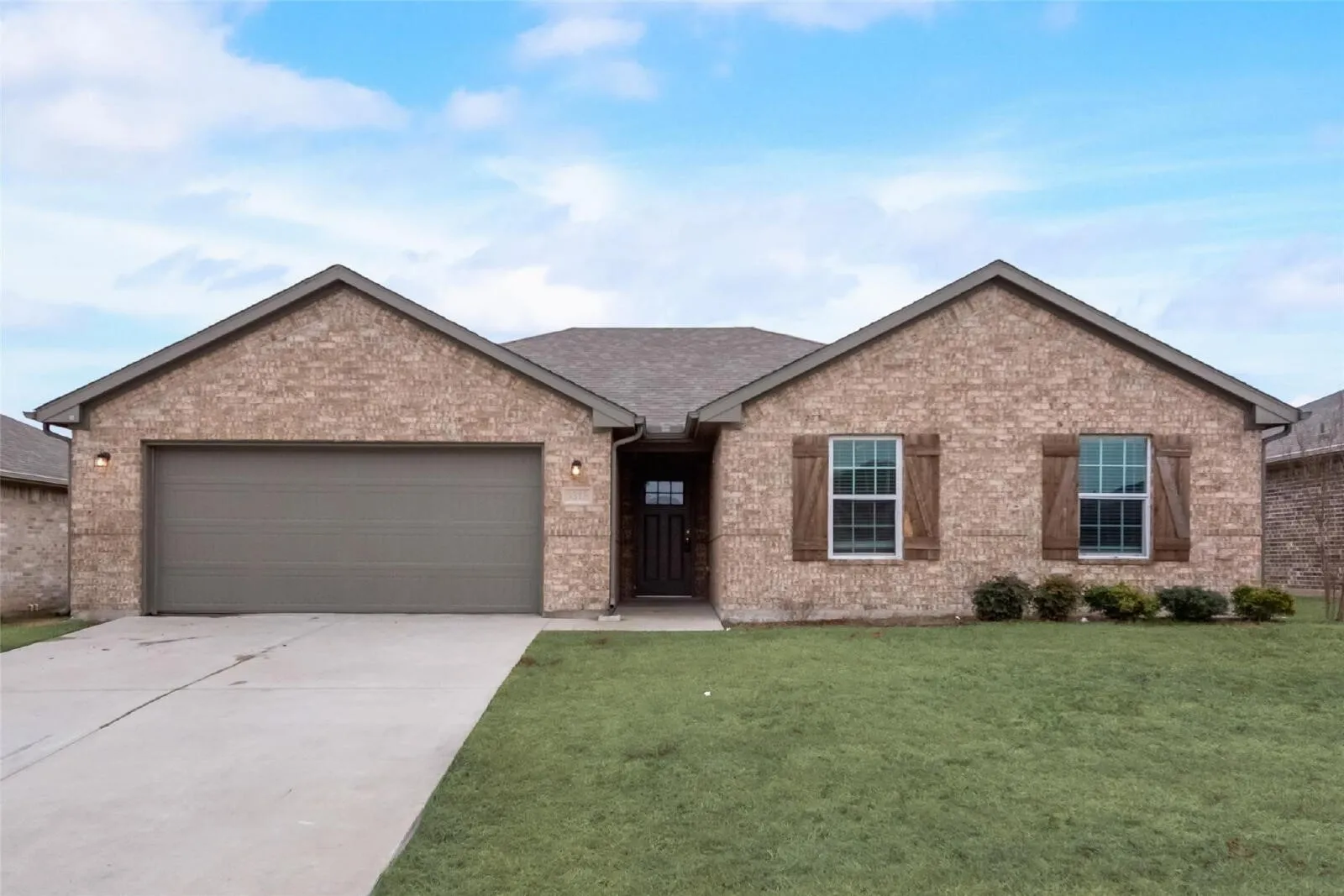 Brick exterior with gabled roof lines
