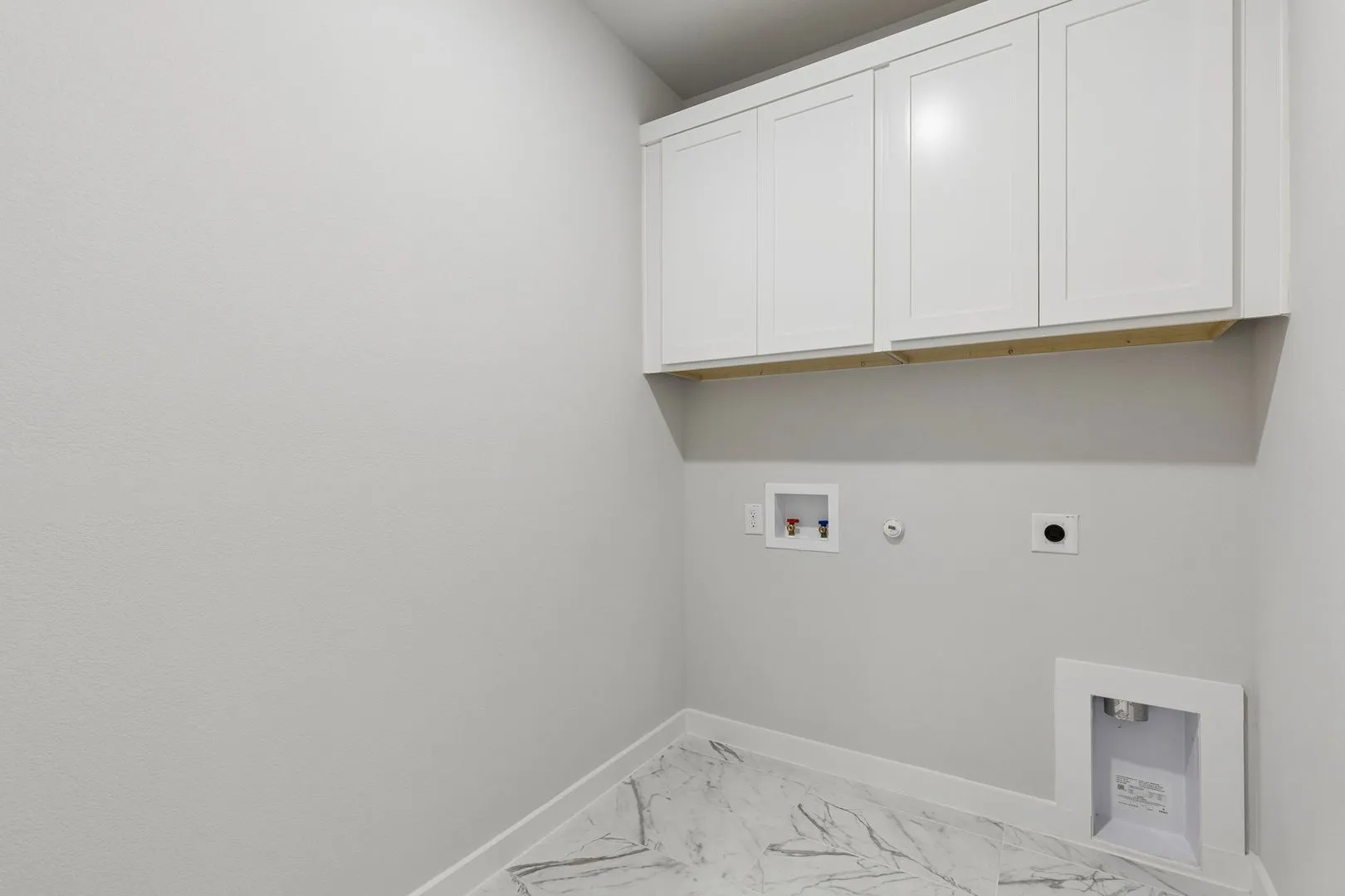 Utility Room in the Winters home plan by Trophy Signature Homes – REPRESENTATIVE PHOTO