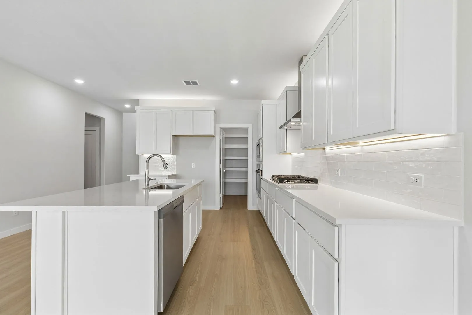 Kitchen in the Winters home plan by Trophy Signature Homes – REPRESENTATIVE PHOTO