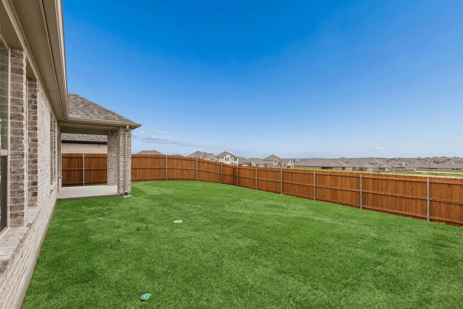 Patio in the Winters home plan by Trophy Signature Homes – REPRESENTATIVE PHOTO