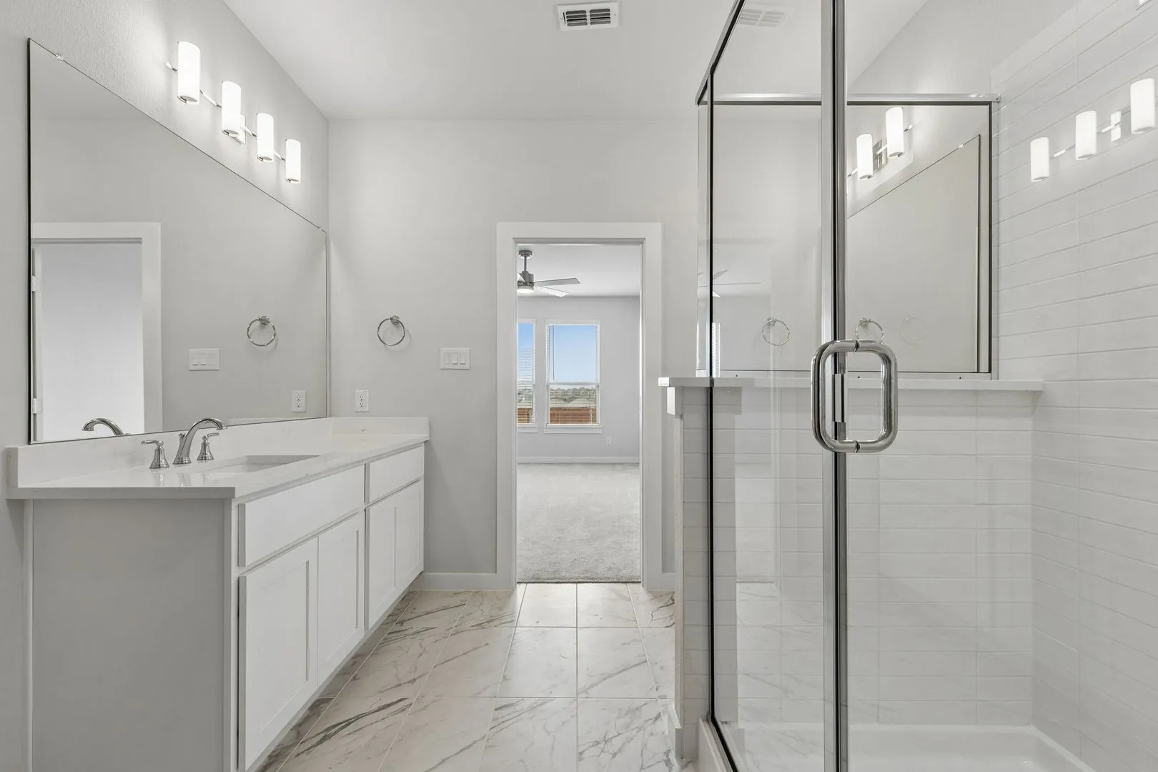 Primary Bathroom in the Winters home plan by Trophy Signature Homes – REPRESENTATIVE PHOTO