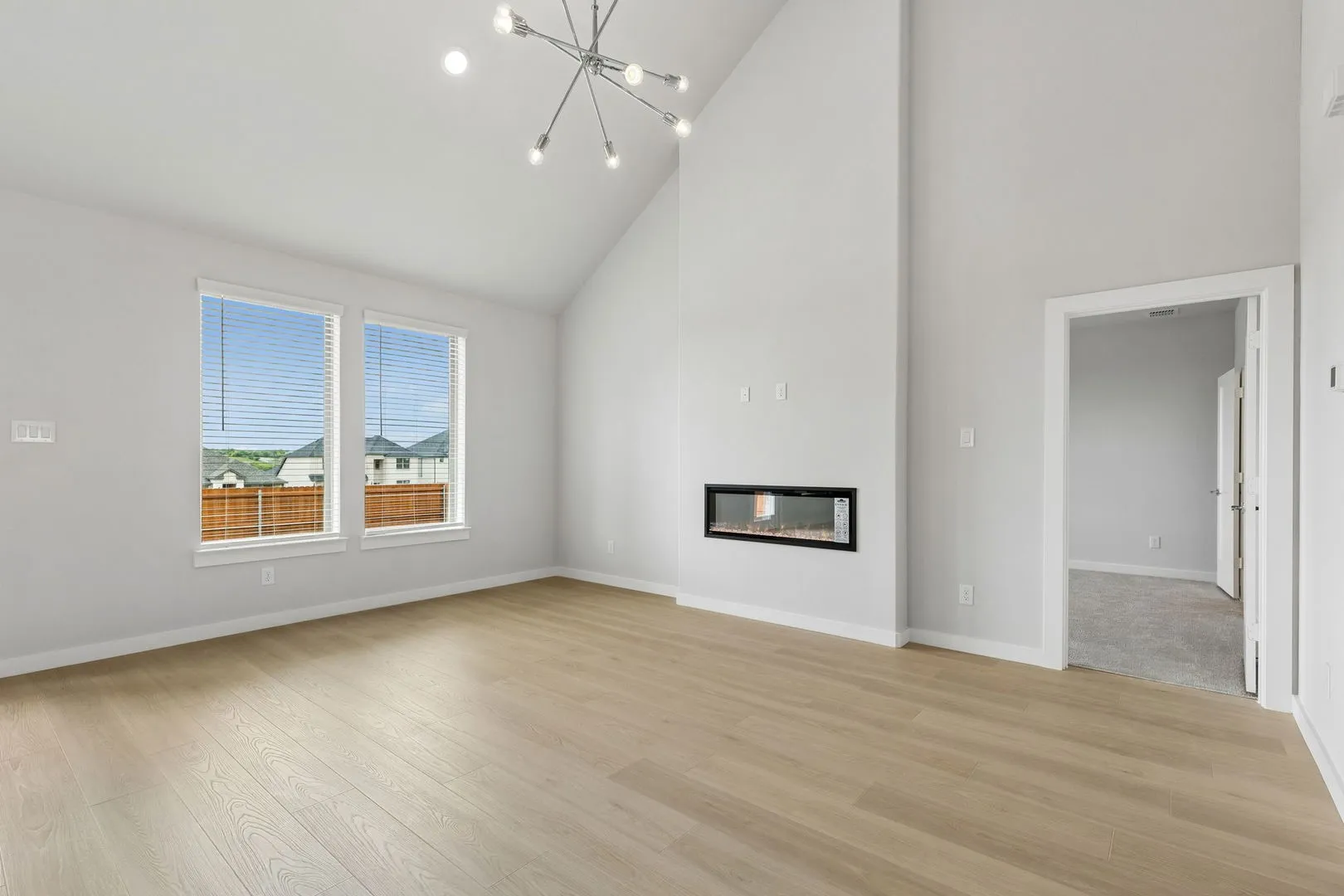 Living Room in the Winters home plan by Trophy Signature Homes – REPRESENTATIVE PHOTO