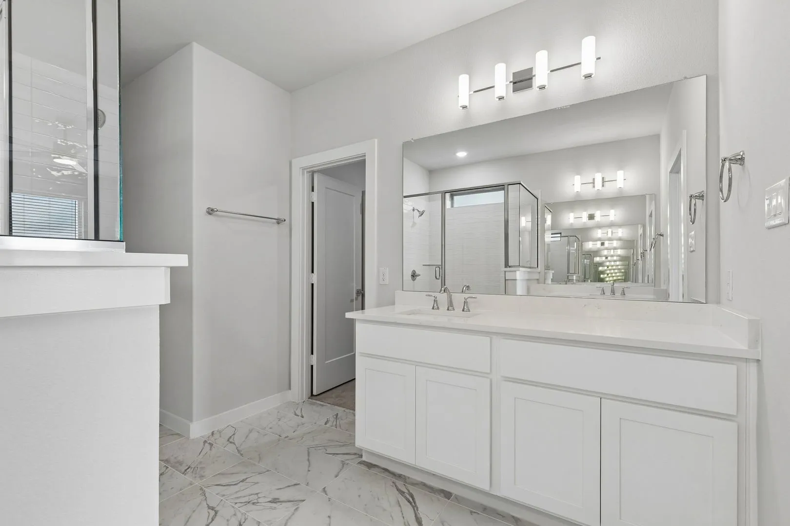 Primary Bathroom in the Winters home plan by Trophy Signature Homes – REPRESENTATIVE PHOTO