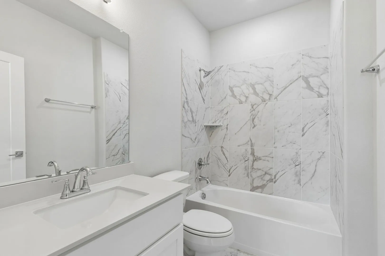 Bathroom in the Winters home plan by Trophy Signature Homes – REPRESENTATIVE PHOTO
