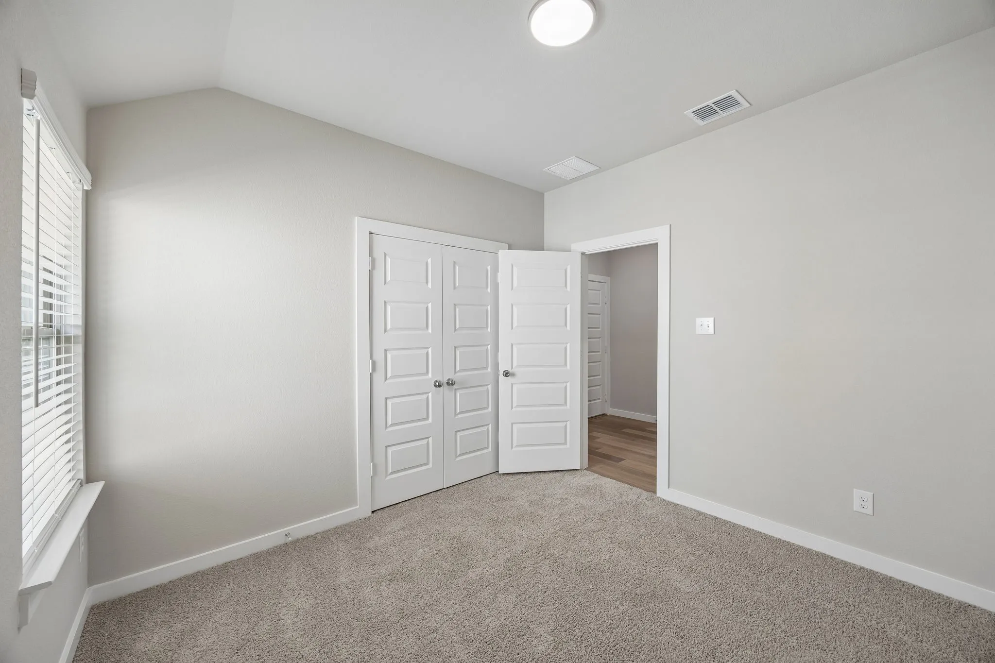 Bedroom in the Emmy II home plan by Trophy Signature Homes - REPRESENTATIVE PHOTO