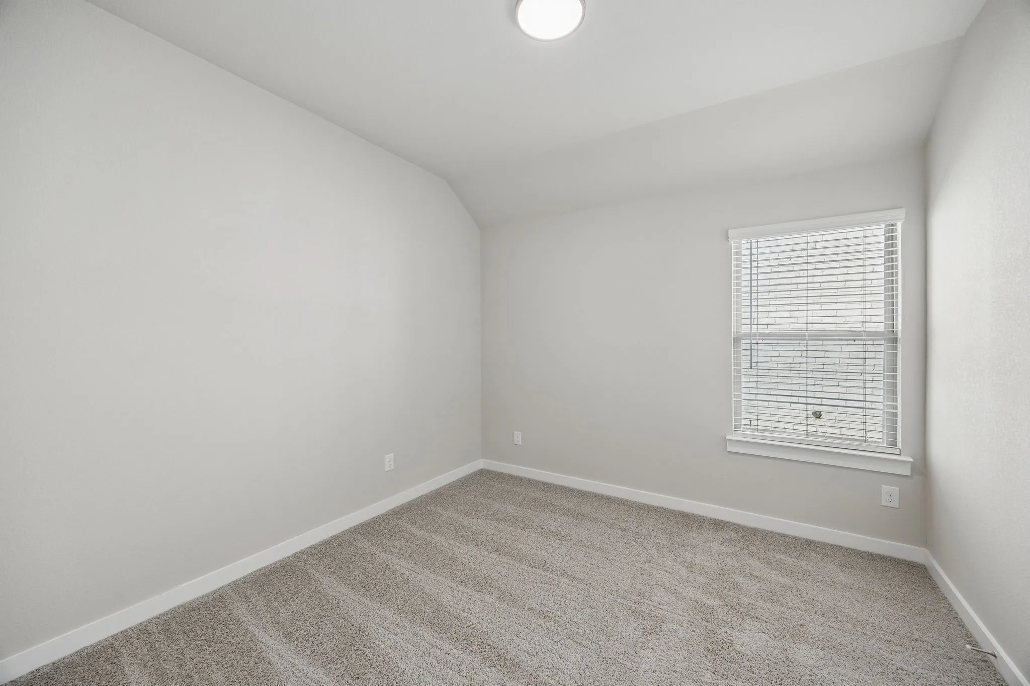 Bedroom in the Emmy II home plan by Trophy Signature Homes - REPRESENTATIVE PHOTO