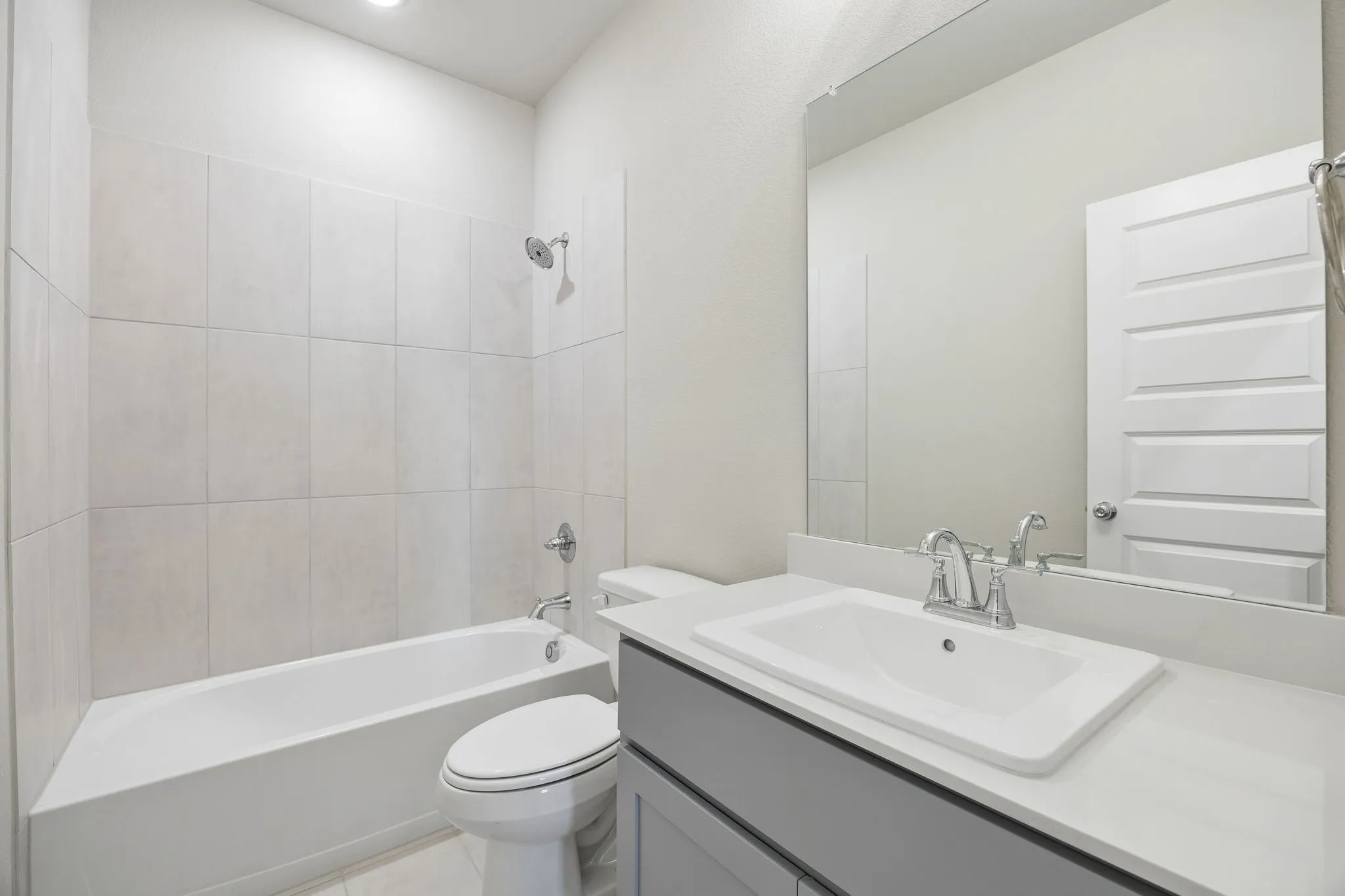 Bathroom in the Emmy II home plan by Trophy Signature Homes - REPRESENTATIVE PHOTO