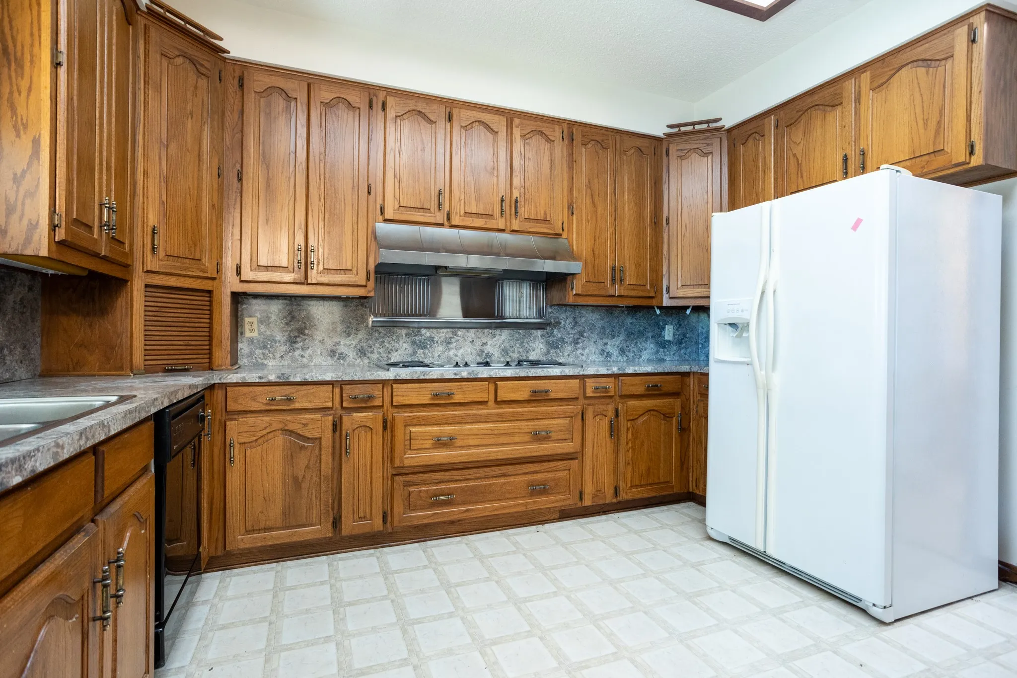 Cook top has vent system with warming shelf.