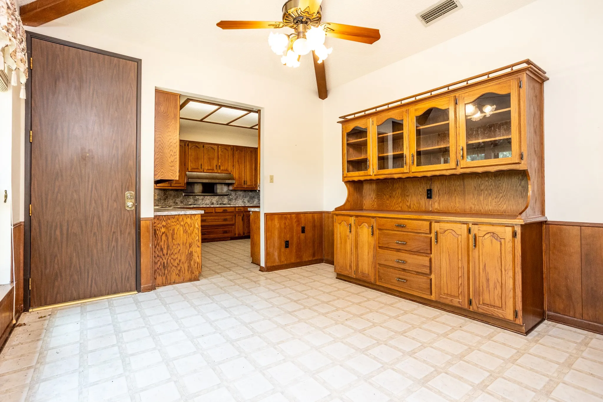 Breakfast area offers door to exterior and patio.