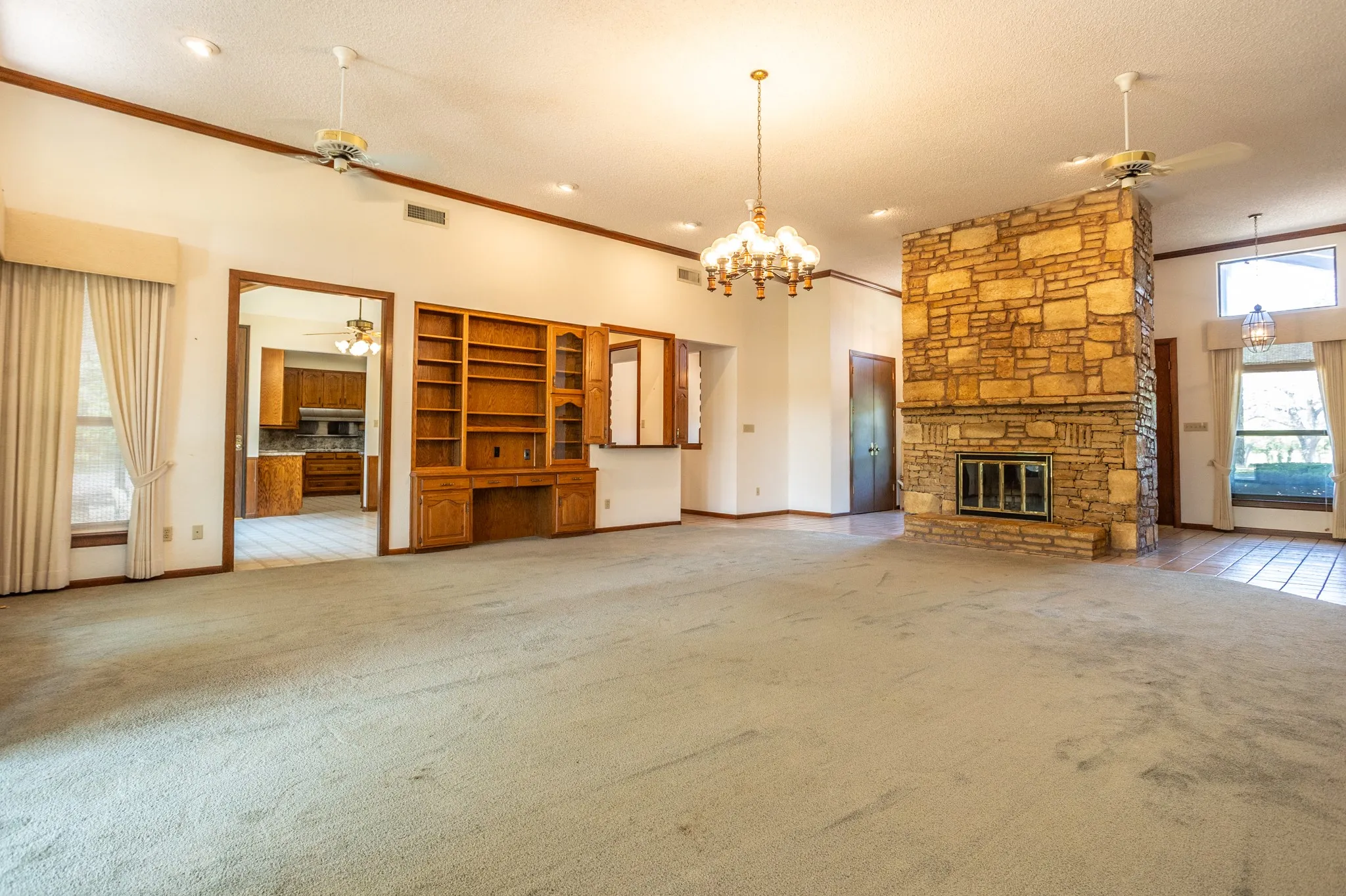 Living looking toard breakfast room and kitchen.  Home designed for entertaining and family gatherings.
