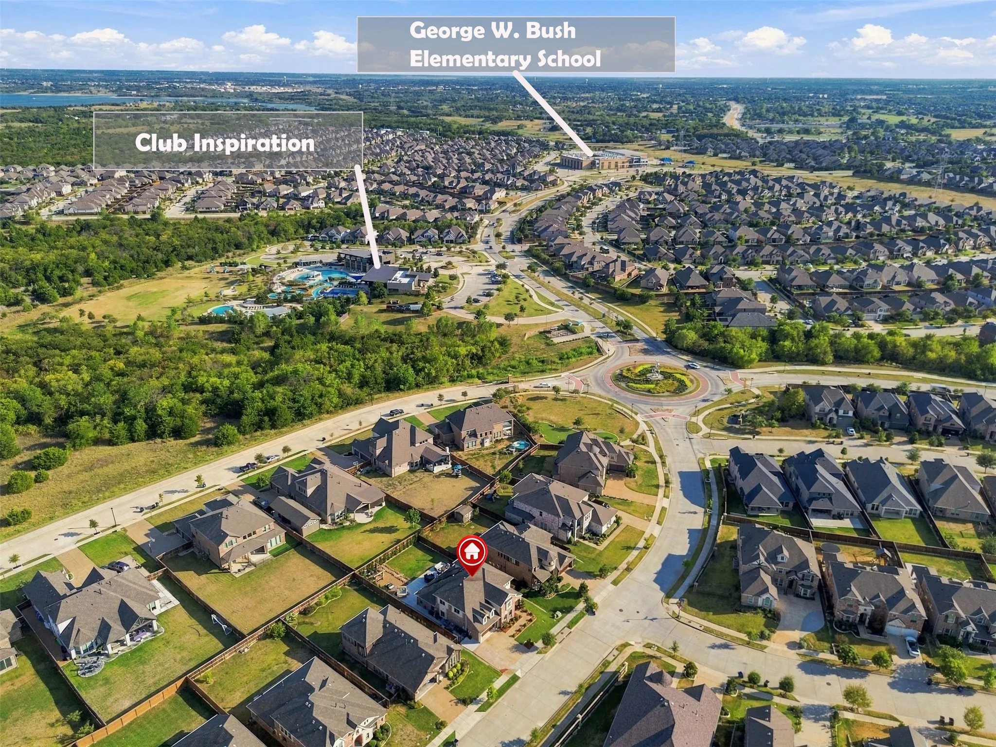 Aerial perspective showing proximity to Club Inspiration and on site elementary school
