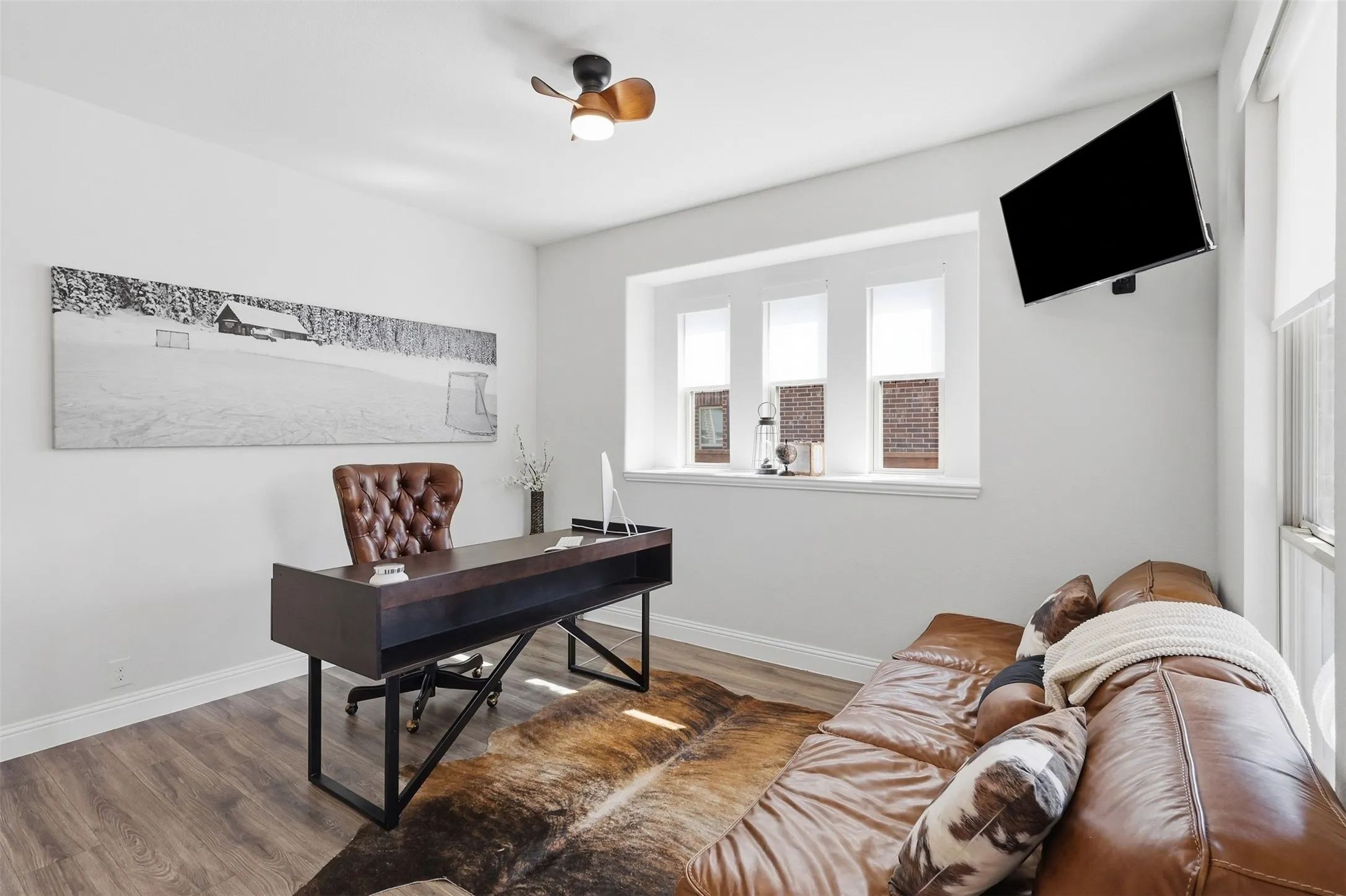Dining area located at the front of the home as soon as you walk in currently being used as an office