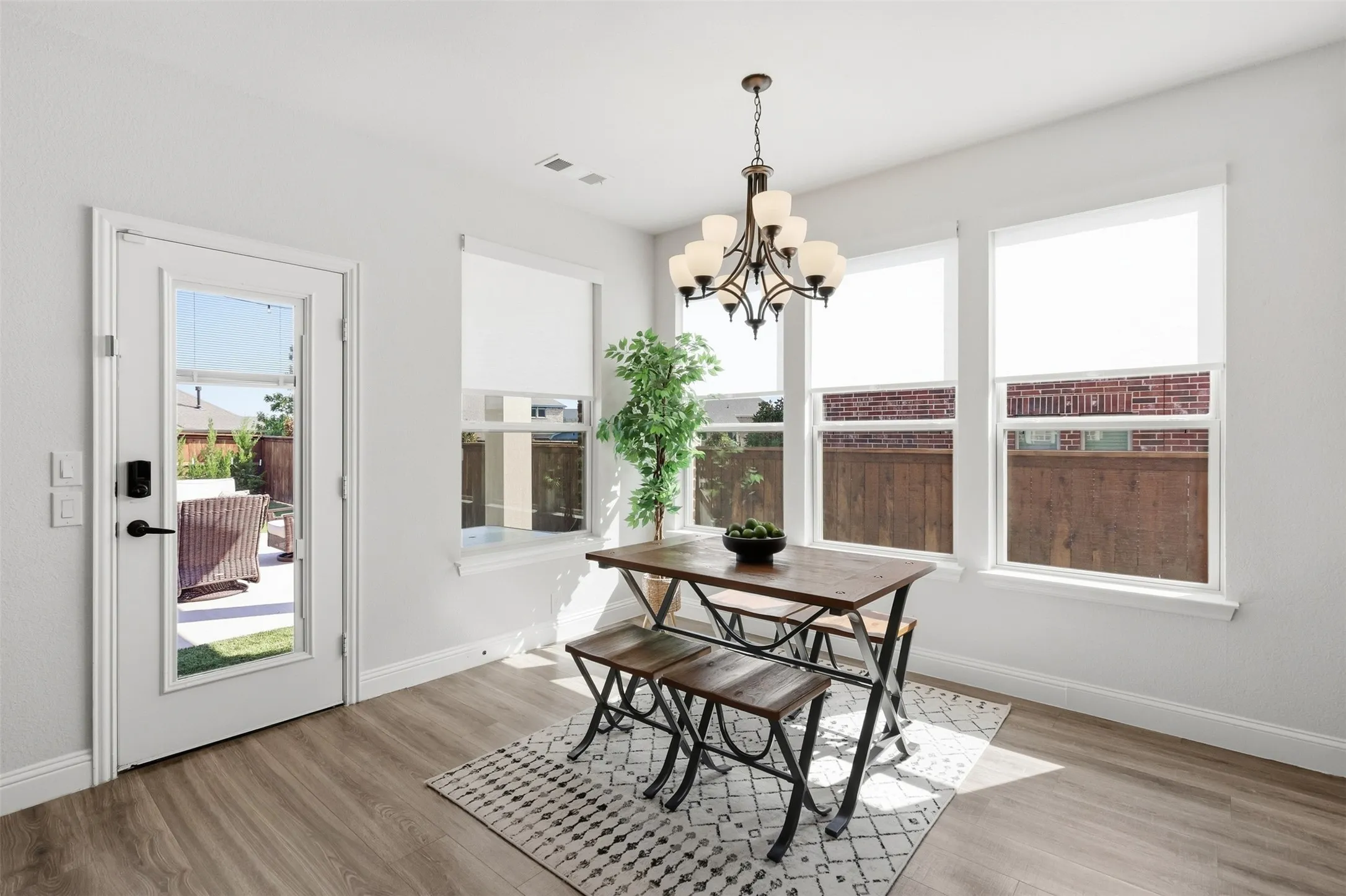 Large dining space perfect for oversized table overlooking your back porch