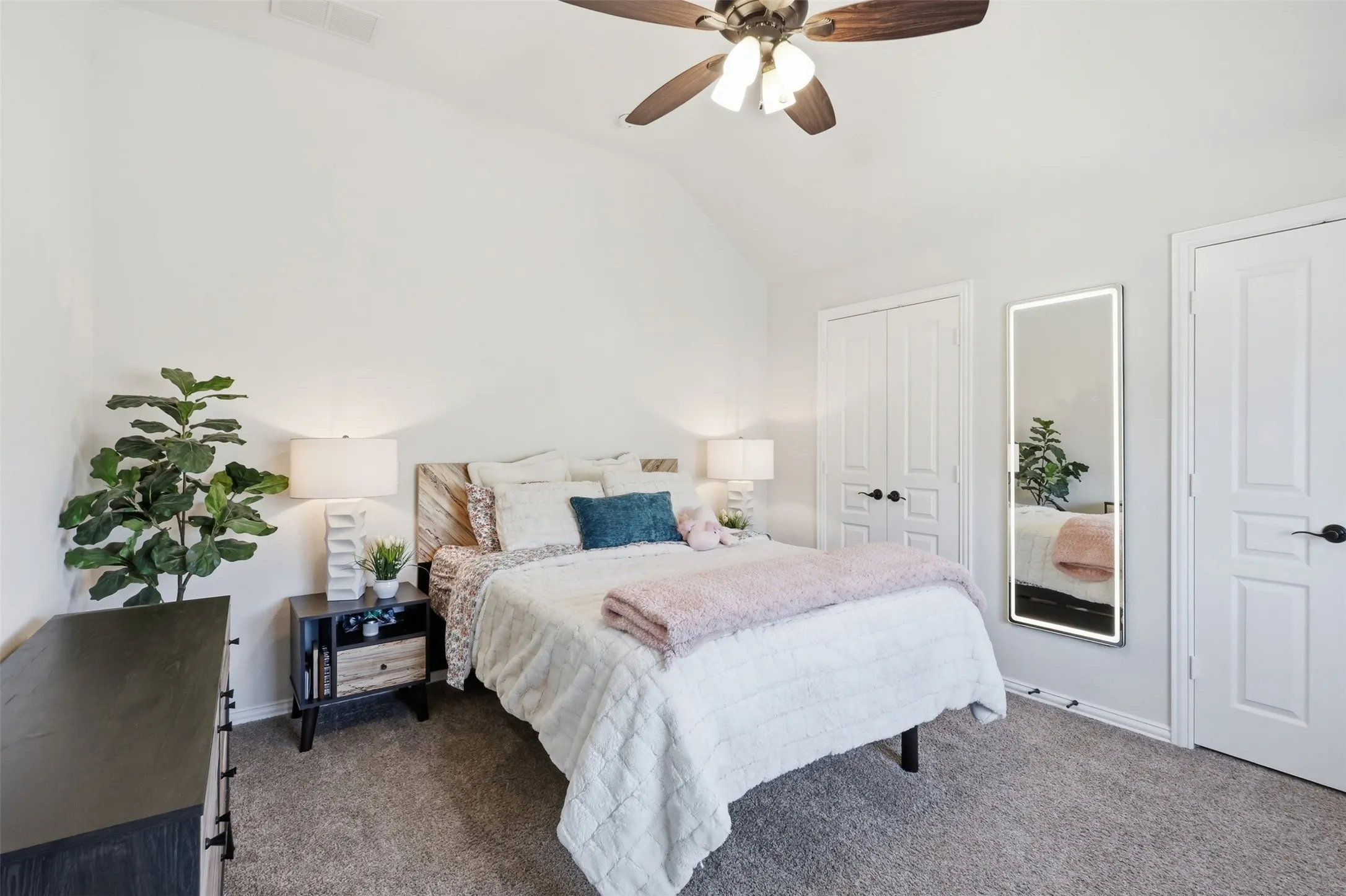 Fourth guest room upstairs with double closets. This is apart of the "Teen Suite" that can easily be converted back to two separate bedrooms.