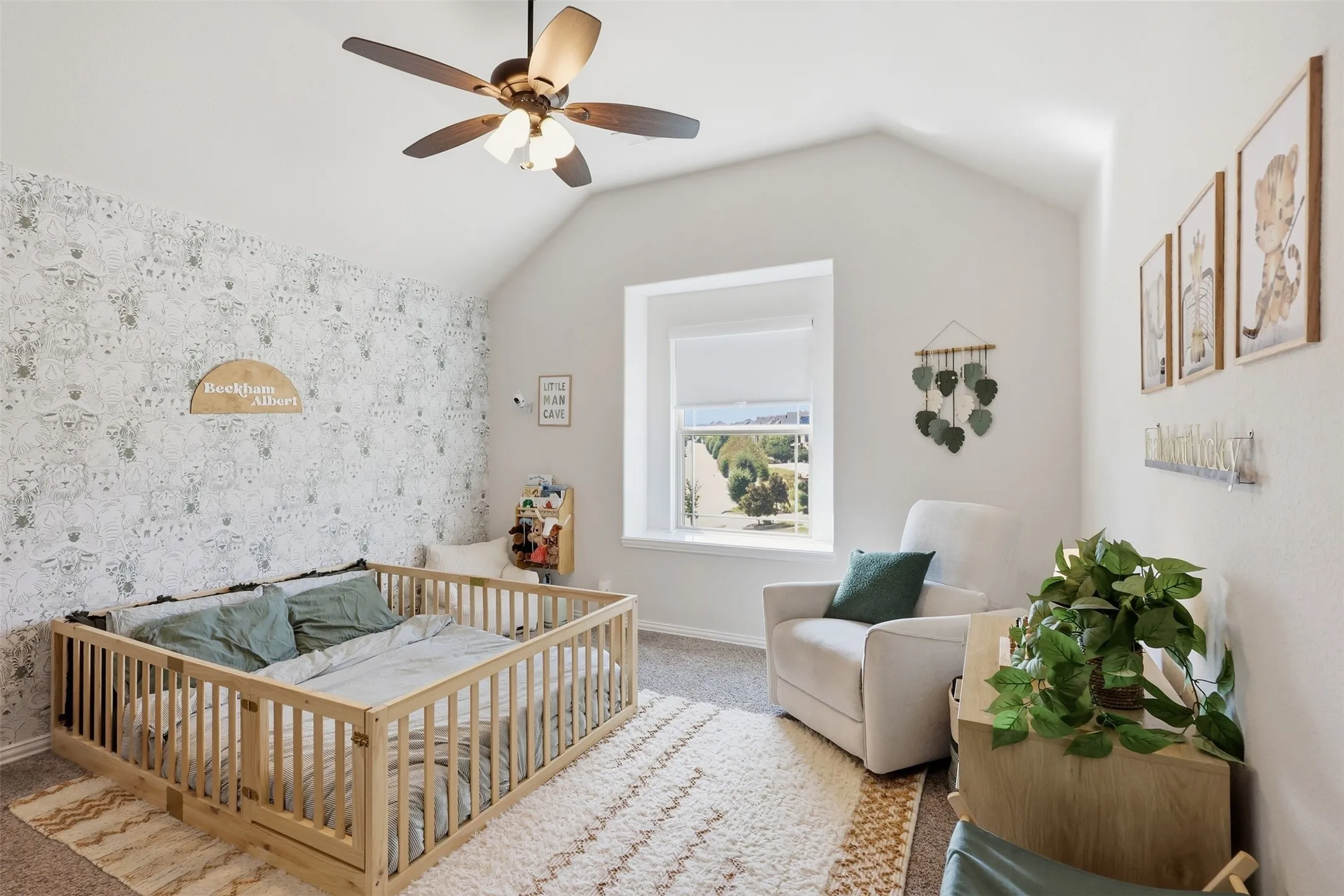 Second guest room located upstairs with vaulted ceilings