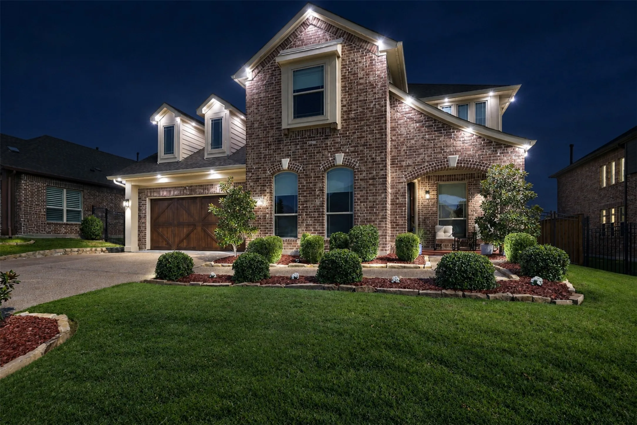 This home features a gorgeous LED track lighting system on the exterior trim controlled via smart device application