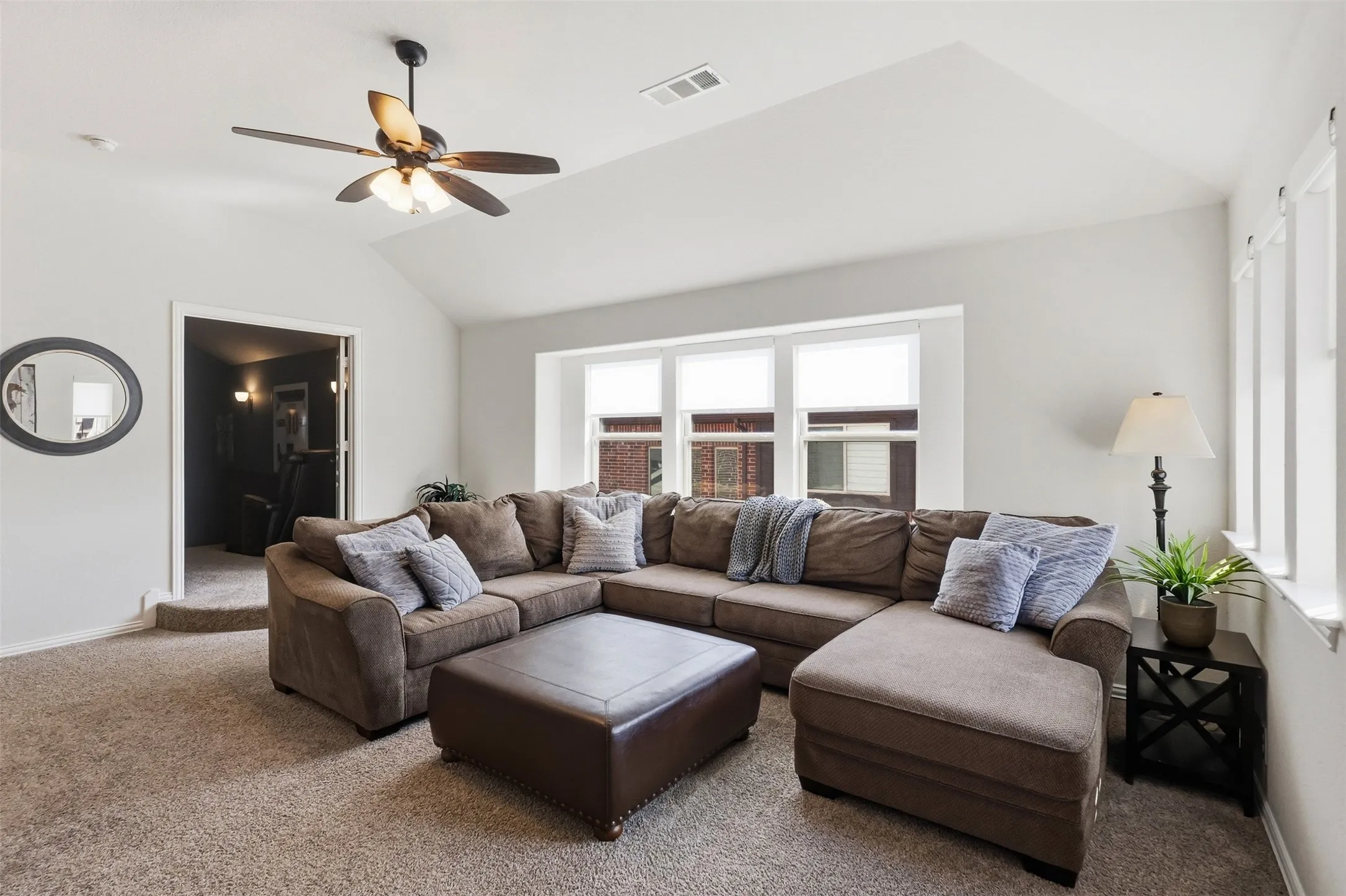 The upstairs living room is just off of the media room. Make this a game room, play room or office!