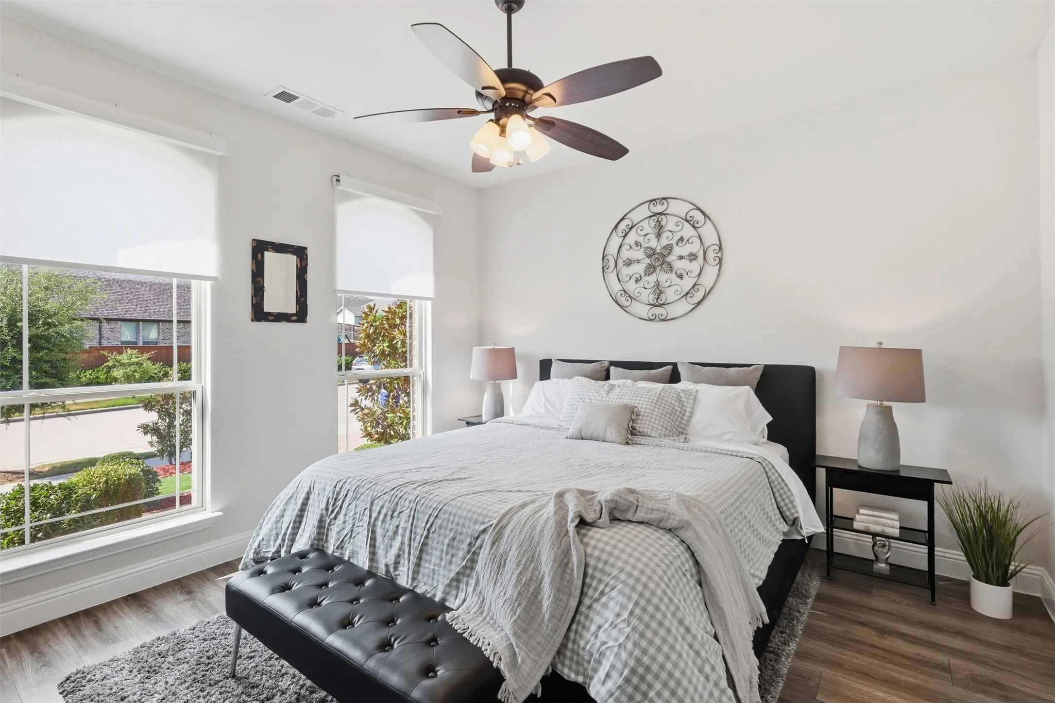First guest room on first floor with French doors. Could be converted into an office. This is a Cali King bed!