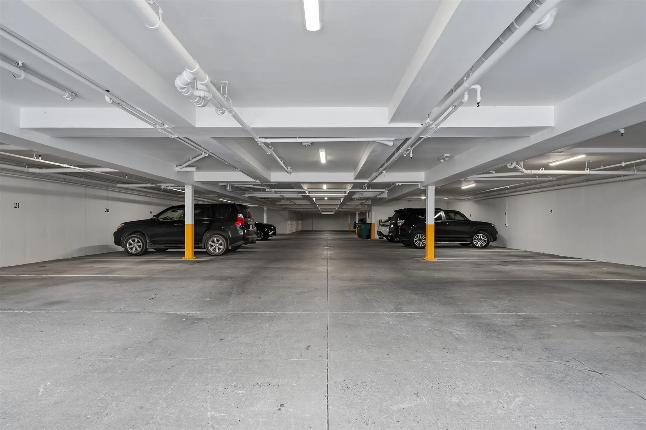 2 covered spaces plus a storage closet for unit 201.