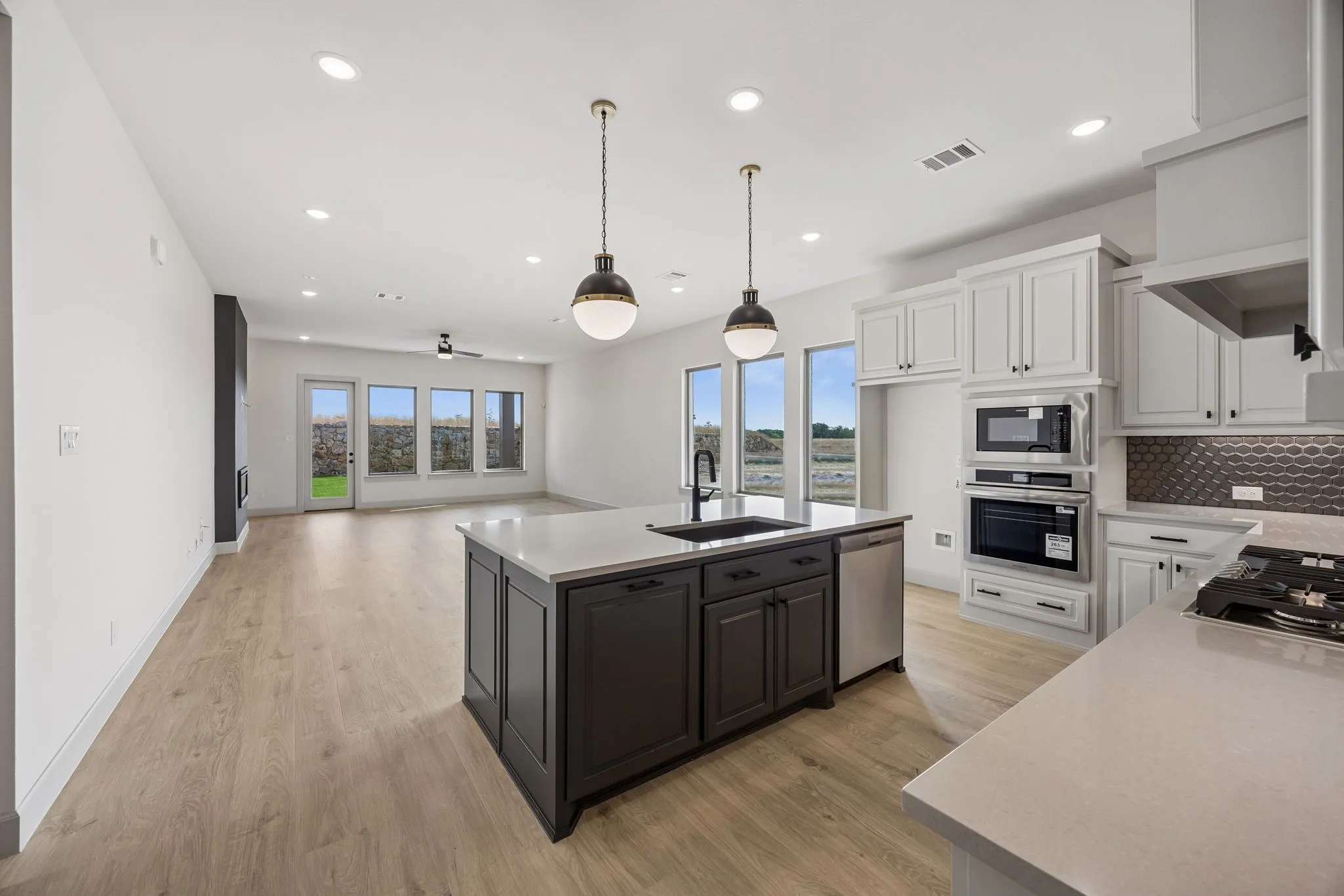 The chef in the family will never be left out of the party in this fantastic open concept floor plan!