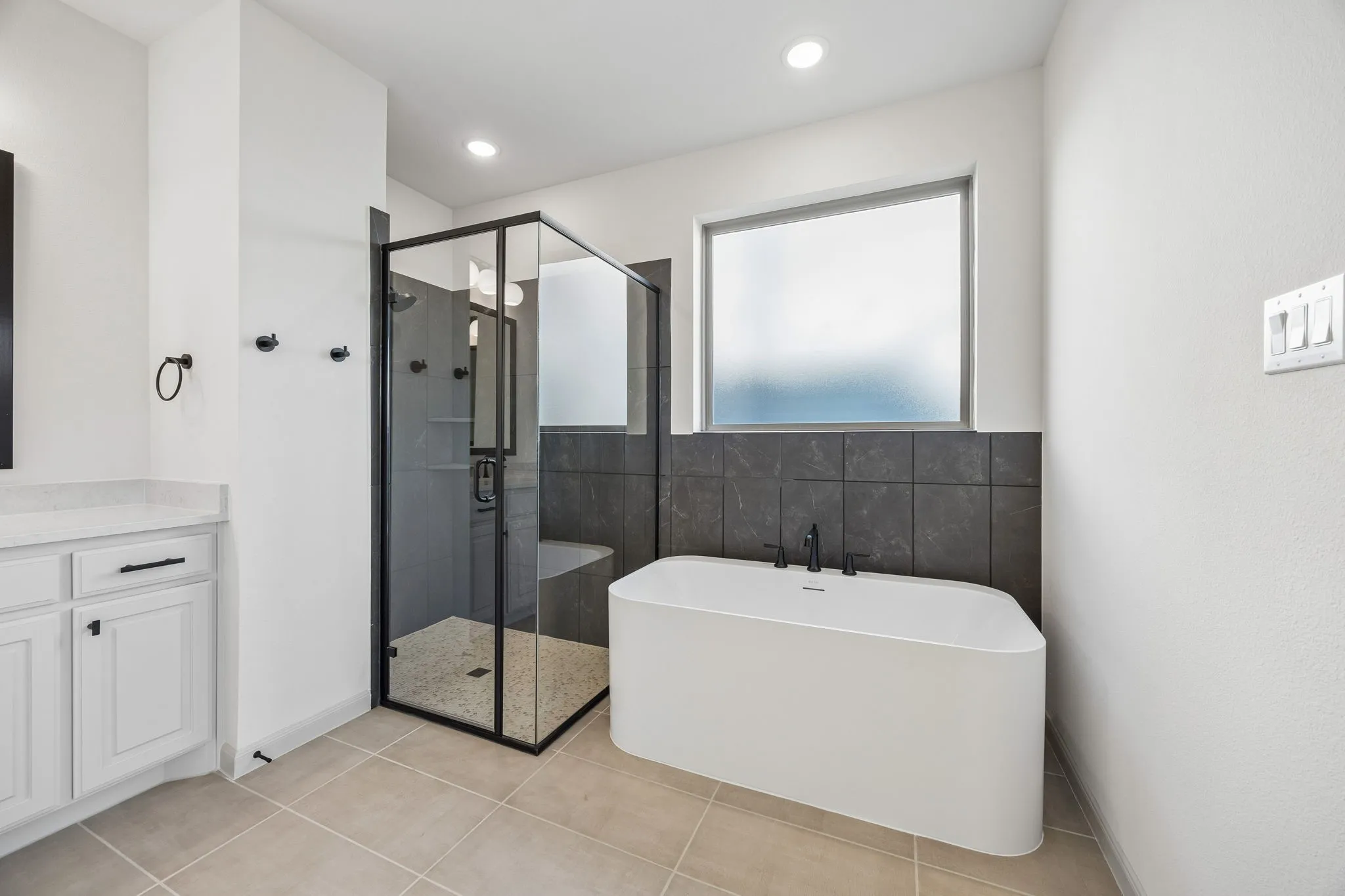 Whether it's soaking your cares away or indulging in a long, luxurious shower, this owner's bath is waiting for your to call it your own!