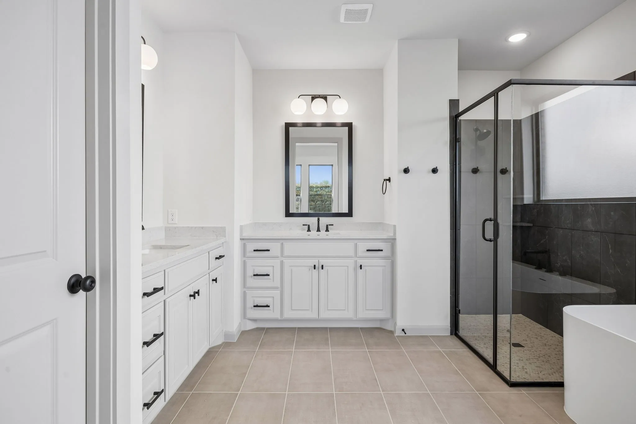 Offering classic finishes, this owner's bath will always be in style!