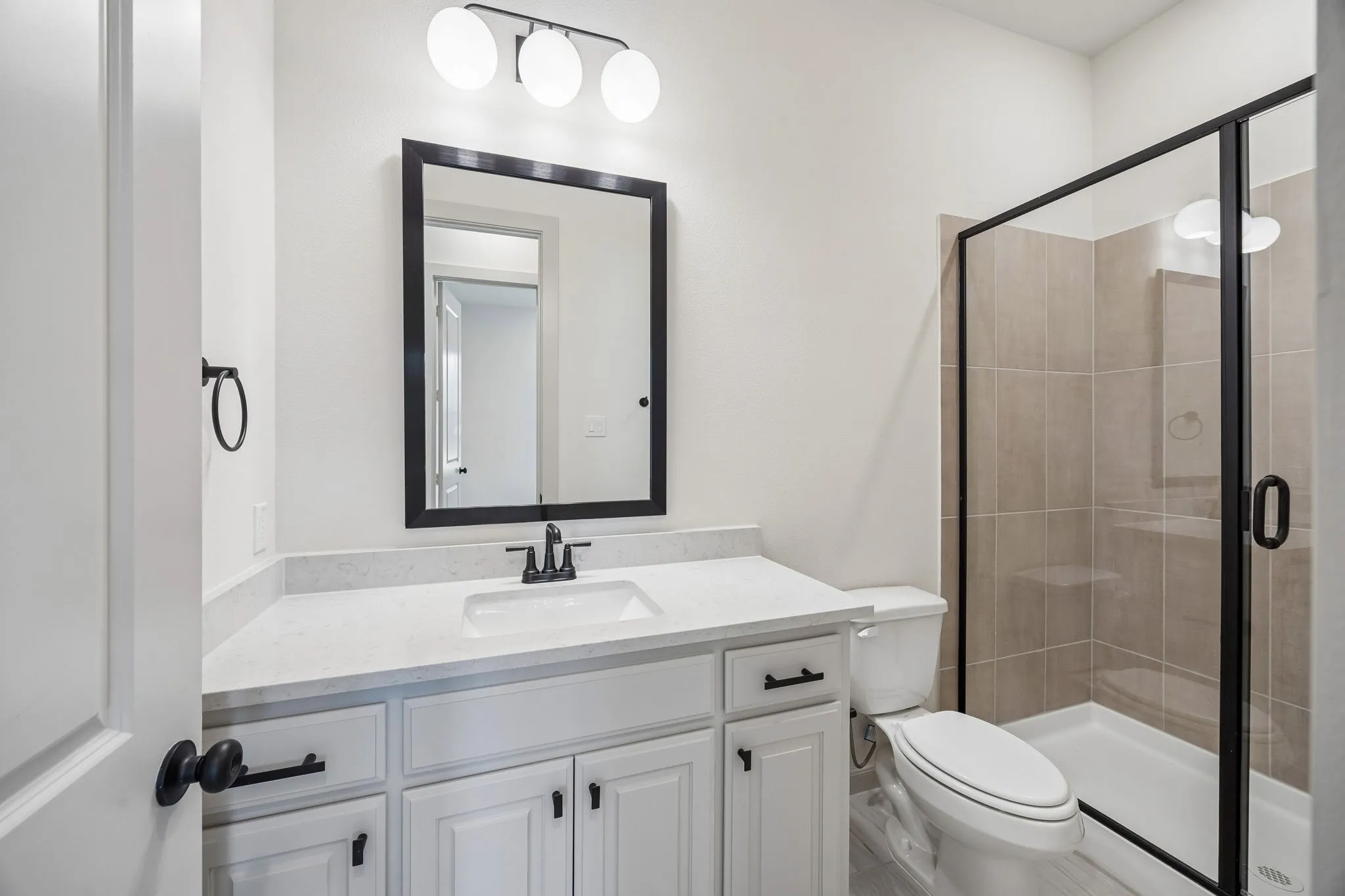 Friends and family will feel right at home in any of the beautifully finished guest baths our Frederic II plan has to offer.