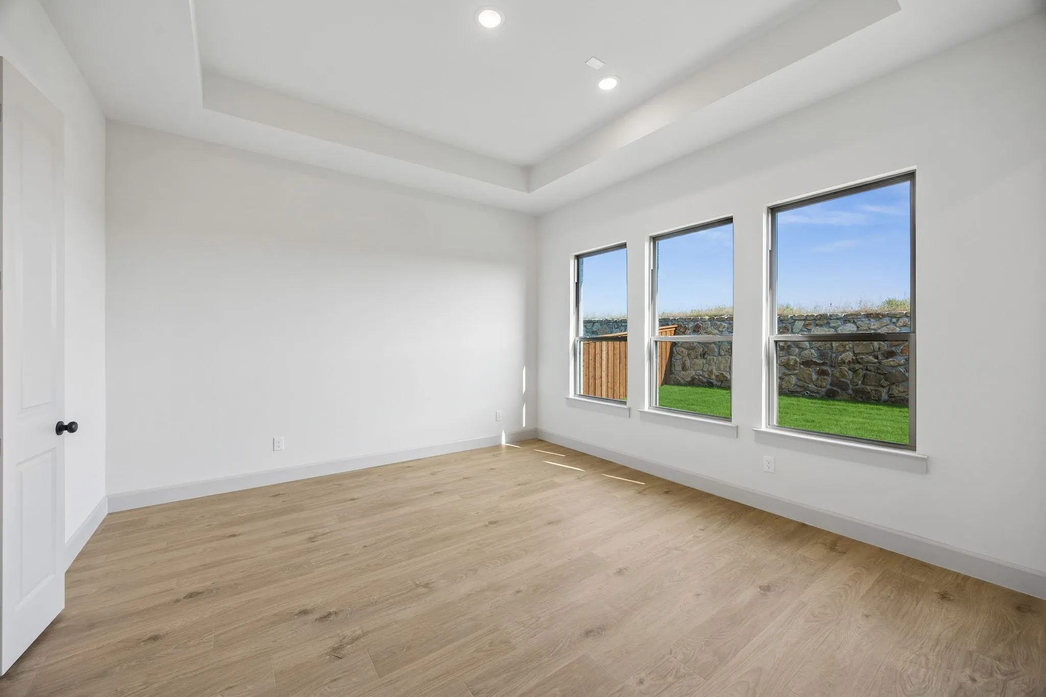 This peaceful and relaxing owner's suite is located at the rear of the home for additional privacy.