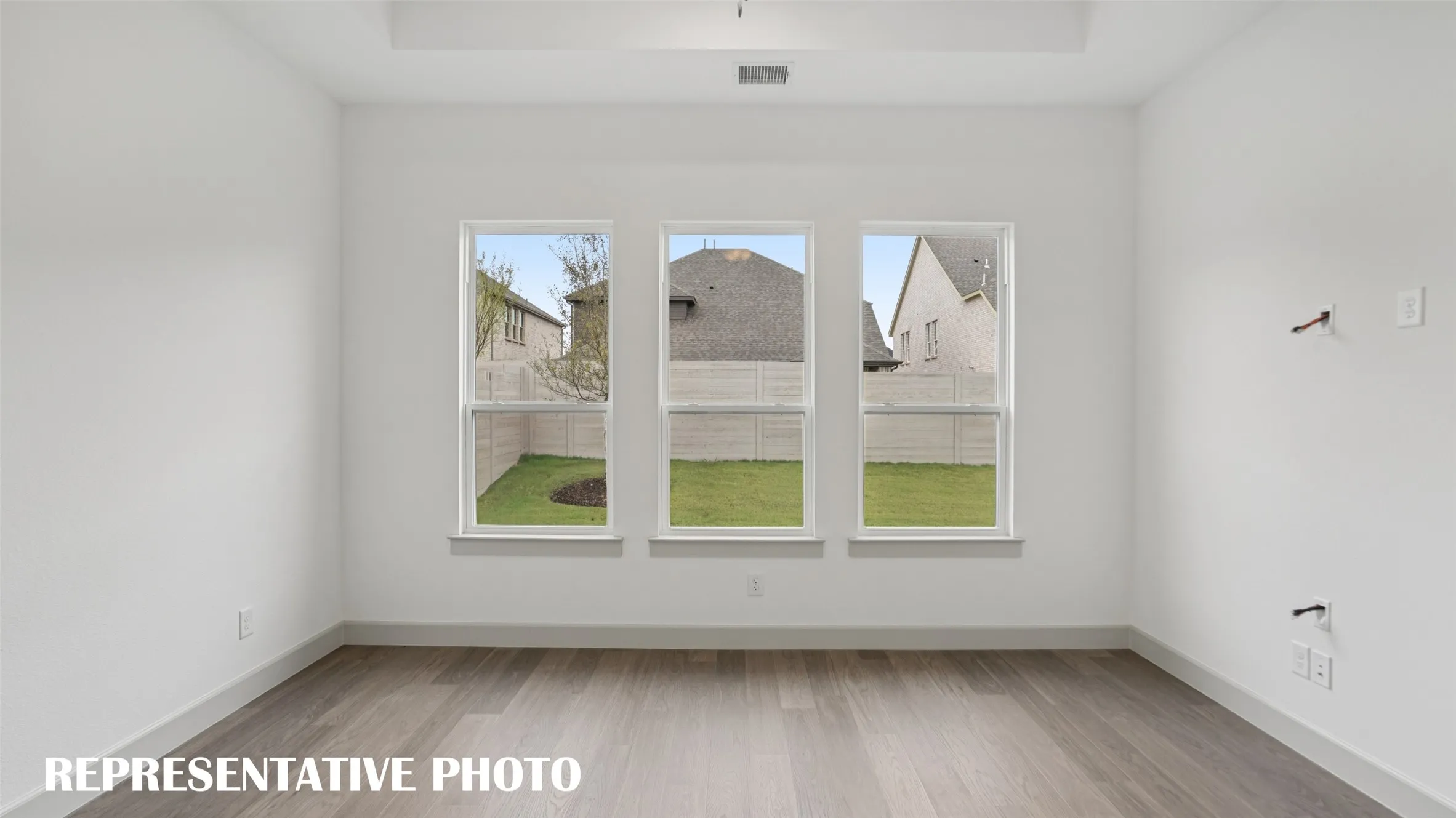 This dreamy owner's suite is located at the rear of the home for additional privacy.  REPRESENTATIVE PHOTO