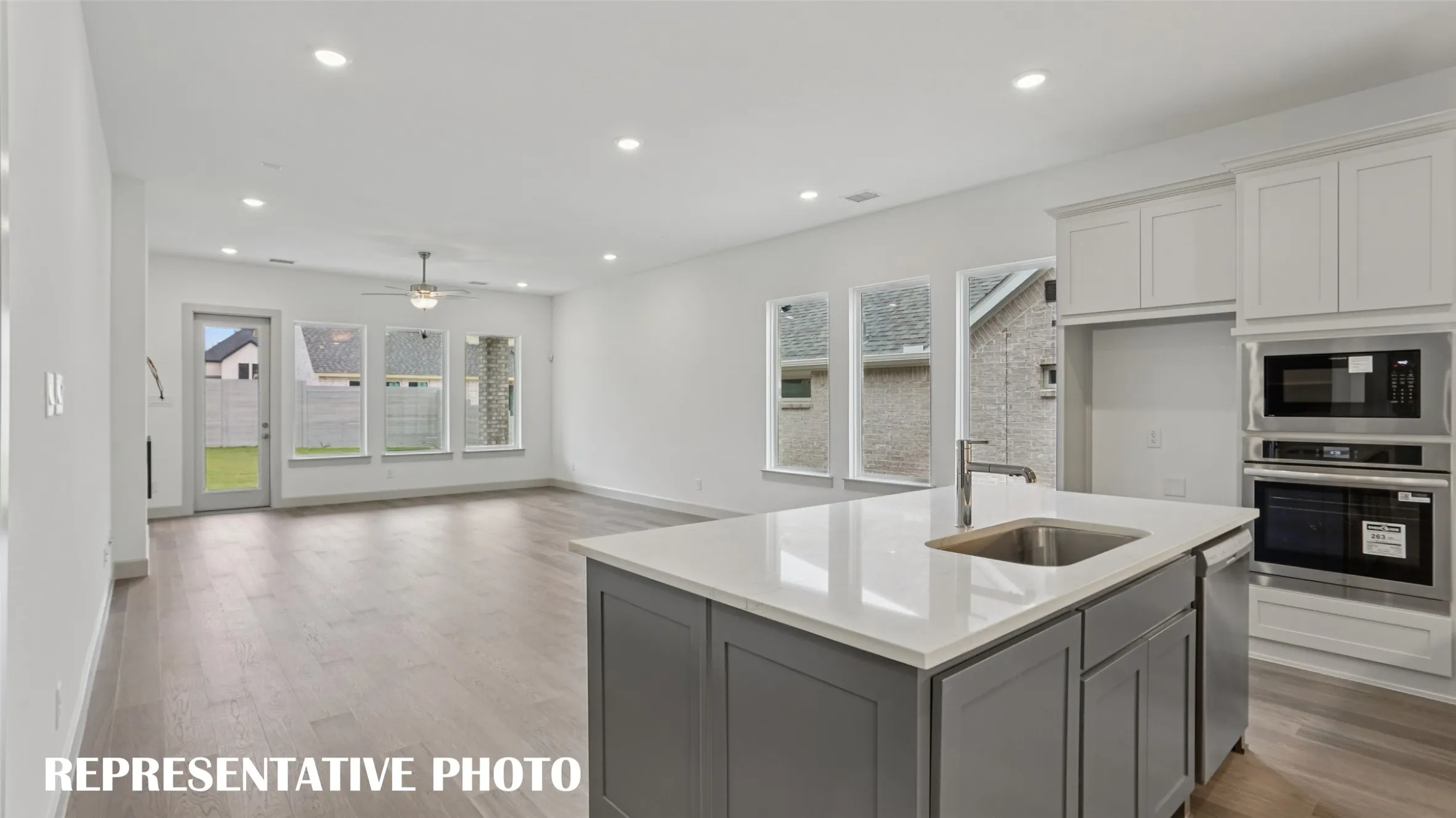 The chef in the family will never be left out of the party in this outstanding open concept floor plan!  REPRESENTATIVE PHOTO