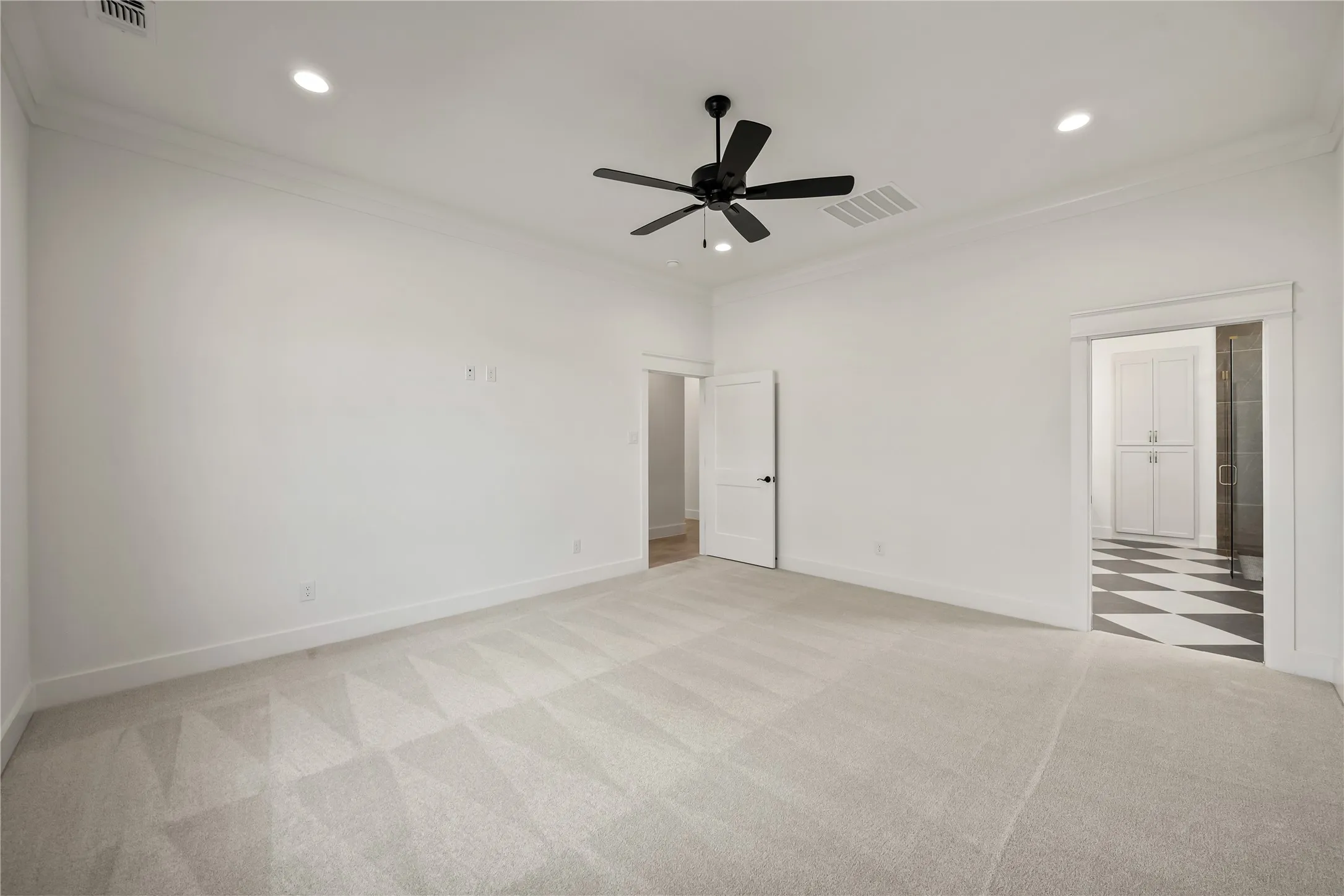 Recessed lighting, crown molding, and a ceiling fan with light kit