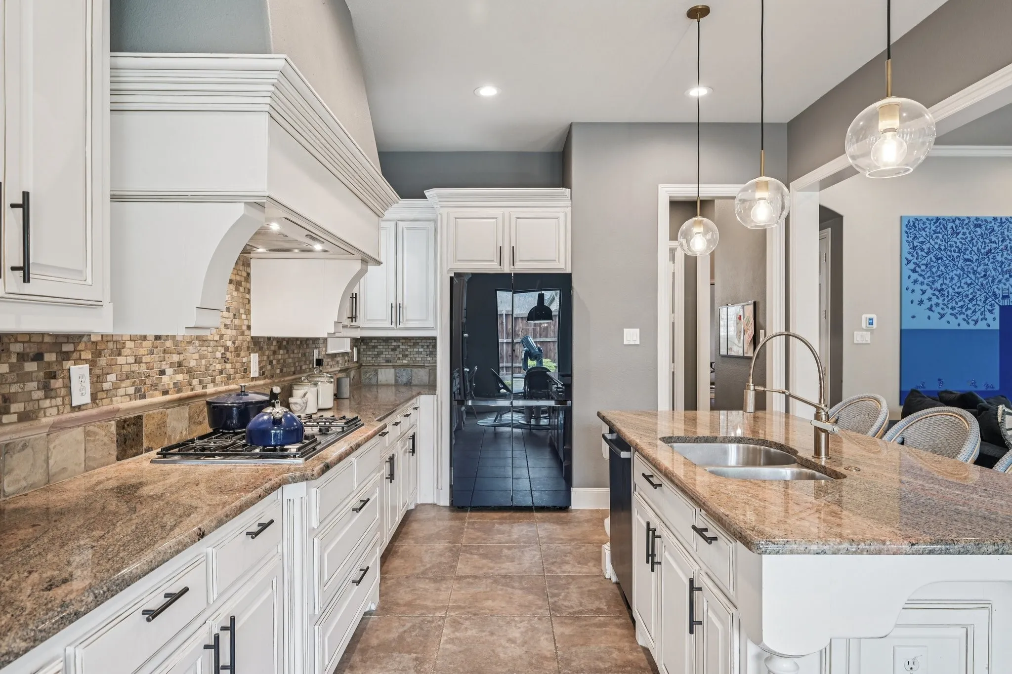 White cabinetry with dark hardware