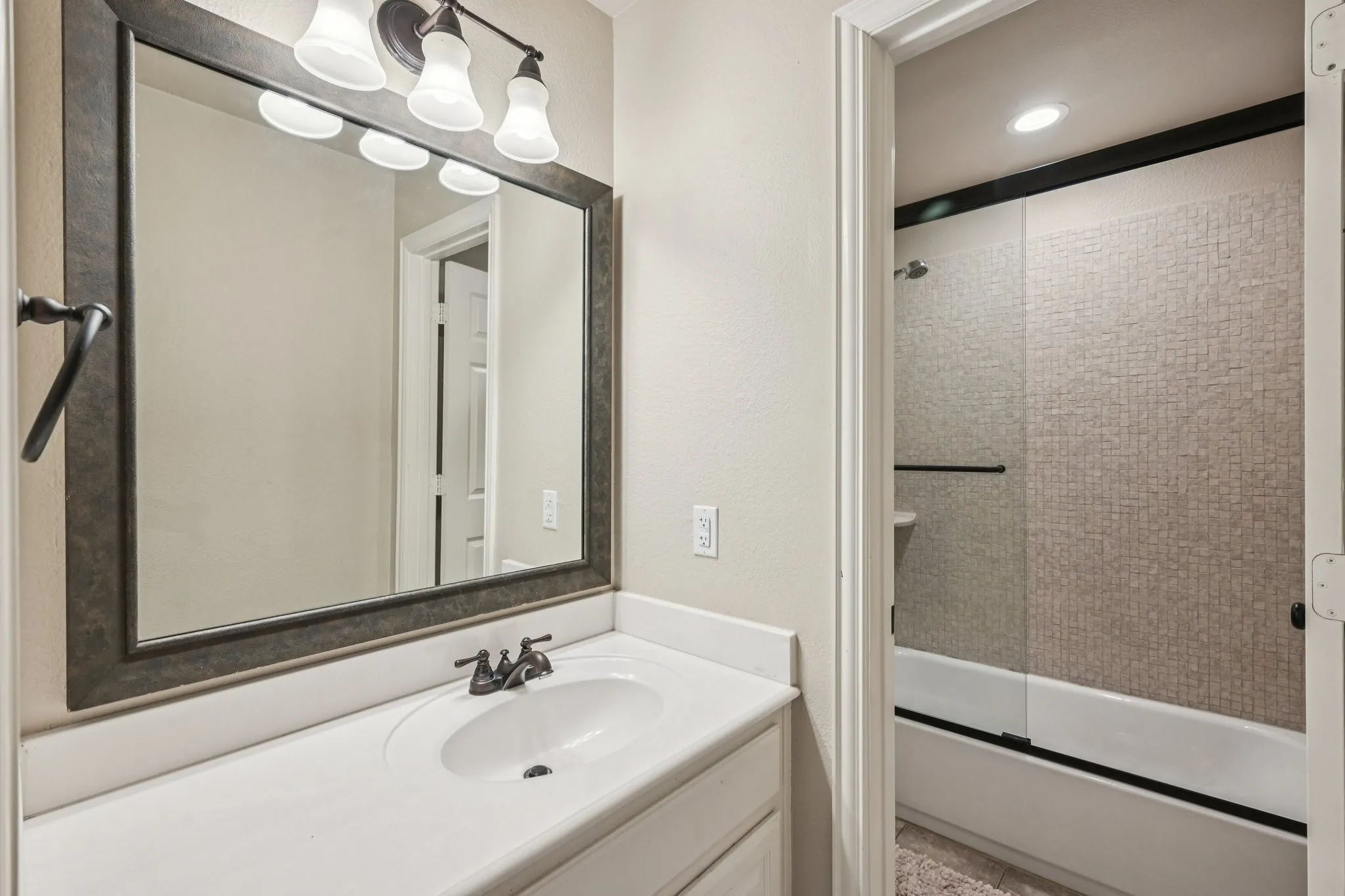 Single vanity with an integrated sink and countertop