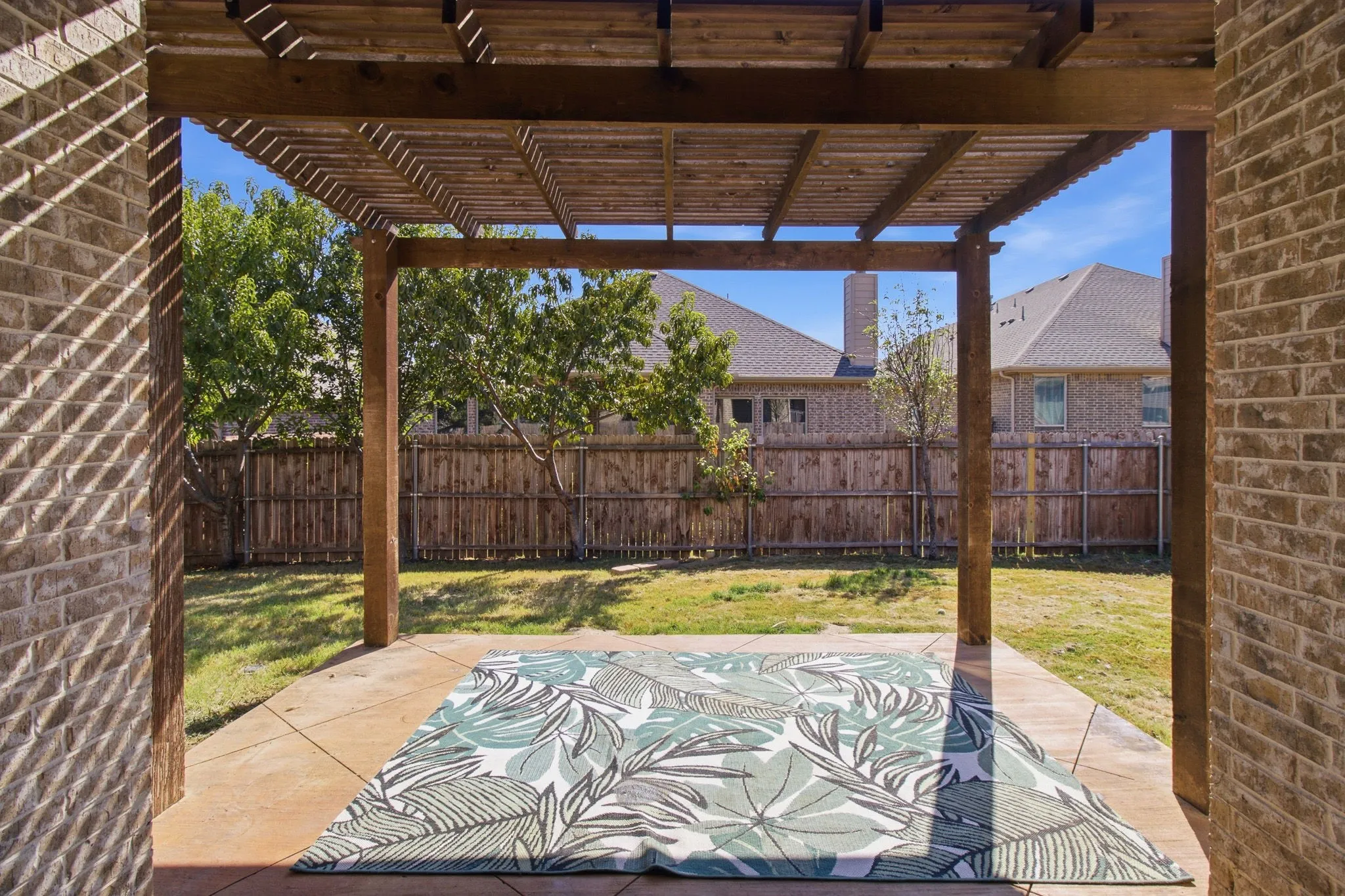 Stained Concrete Covered Patio and Pergola