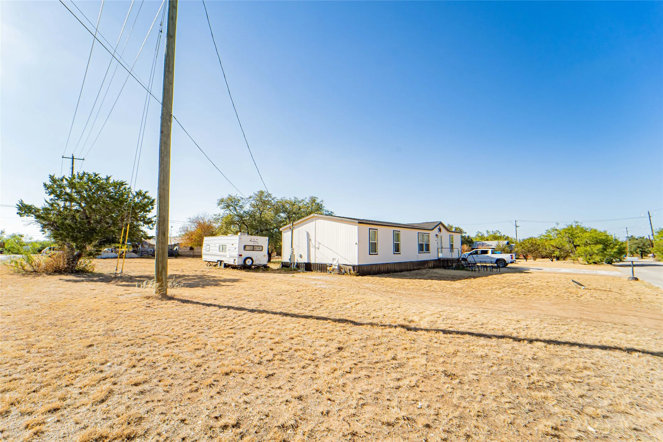Mobile Home For Sale in Stephens County , 915 S Miller Street, Breckenridge, Texas 76424, 4 Bedroom, 2 Bathroom, Garage spaces, 1,500 Sqft, built in 2024, mls#21390844, Real Estate Agent in Breckenridge, Homes For Sale in Stephens county, Homes For Sale in Breckenridge, Realtor in Breckenridge Texas, Real Estate Brokerage Independent Realty Texas, Luminita Cordes Realtor