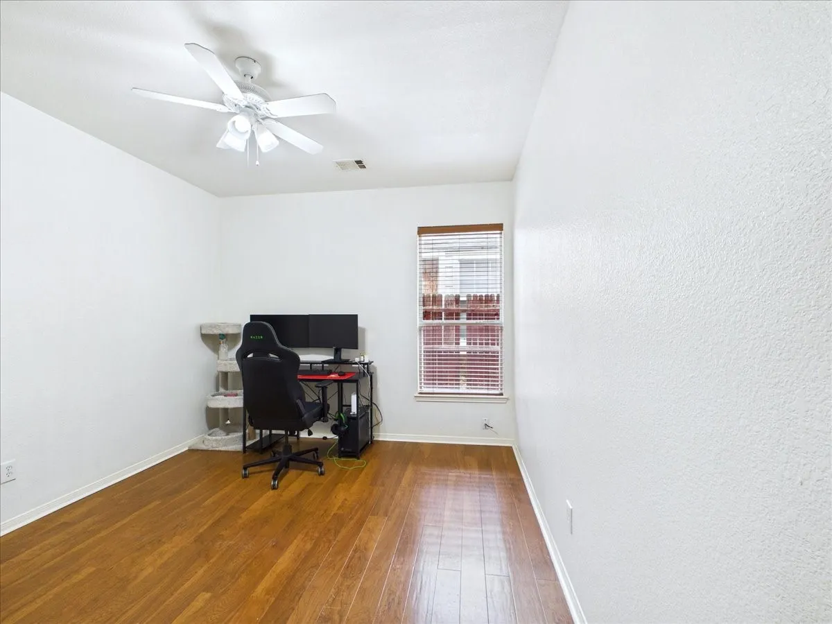 Wood-finish flooring with crisp white walls