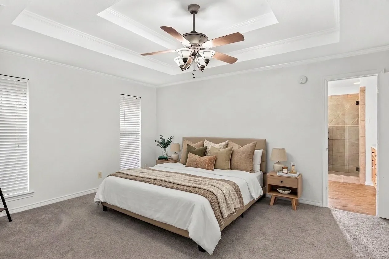 Spacious primary with tray ceiling