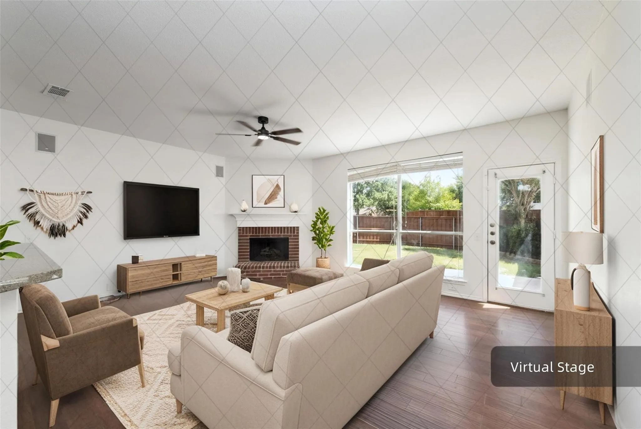 Vaulted ceiling with a ceiling fan, brick fireplace with a mantel, wood-finish flooring, large window, and a glass-paned door