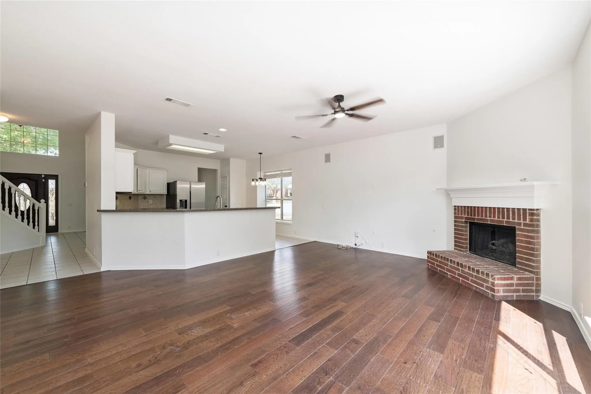 Wood-finish flooring throughout the main living space