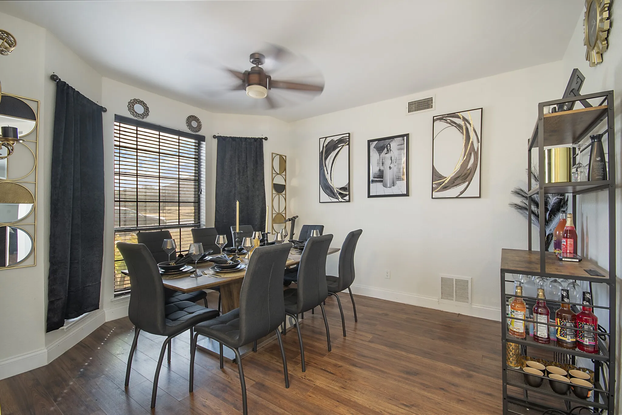 Formal dining room with a bay window, just off the entry.