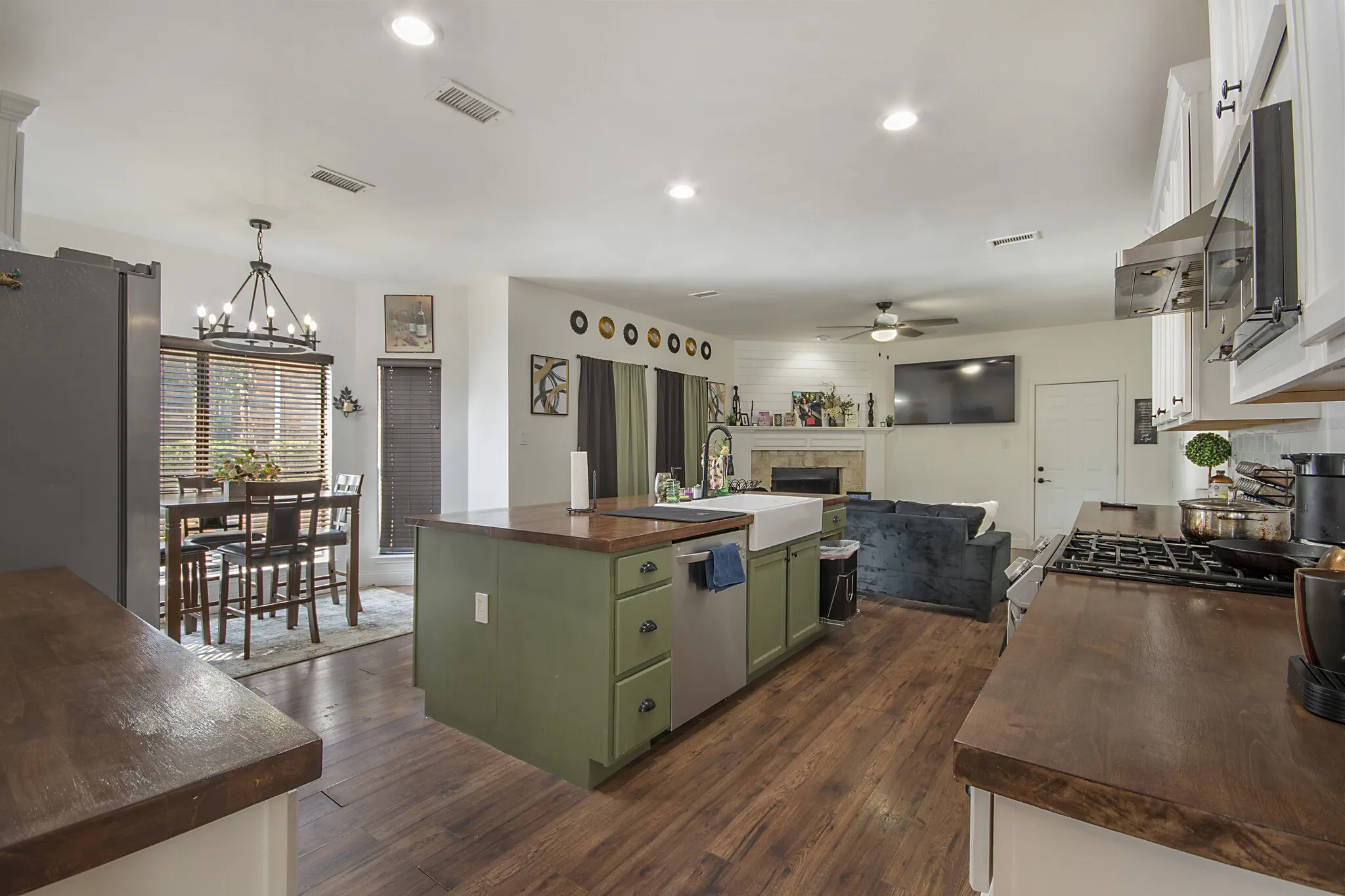 Kitchen open to the breakfast area and family room.