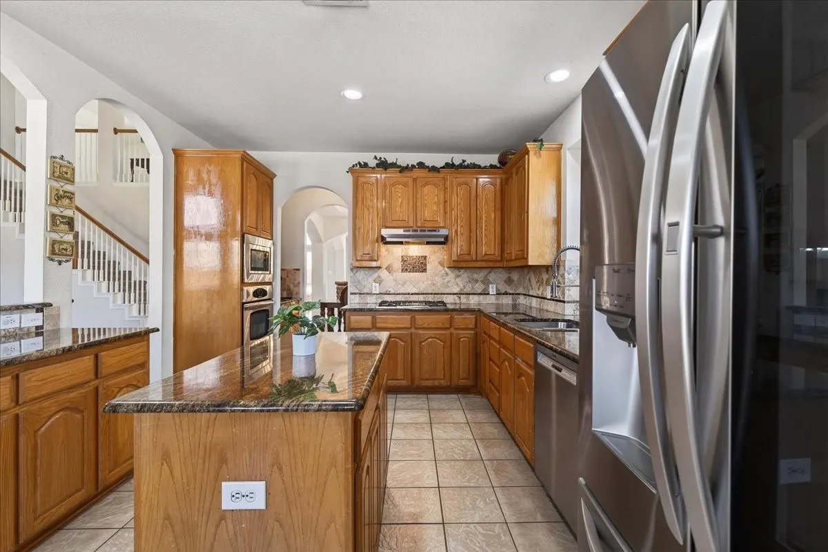 Formal dining area as you enter the home, shows the stacked formals