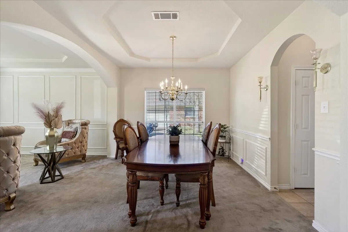 Formal dining area as you enter the home, shows the stacked formals