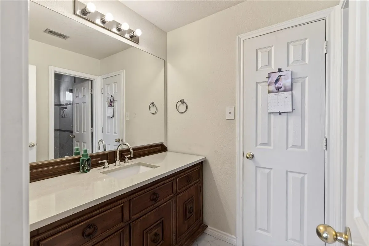 The vanity area of the bathroom
