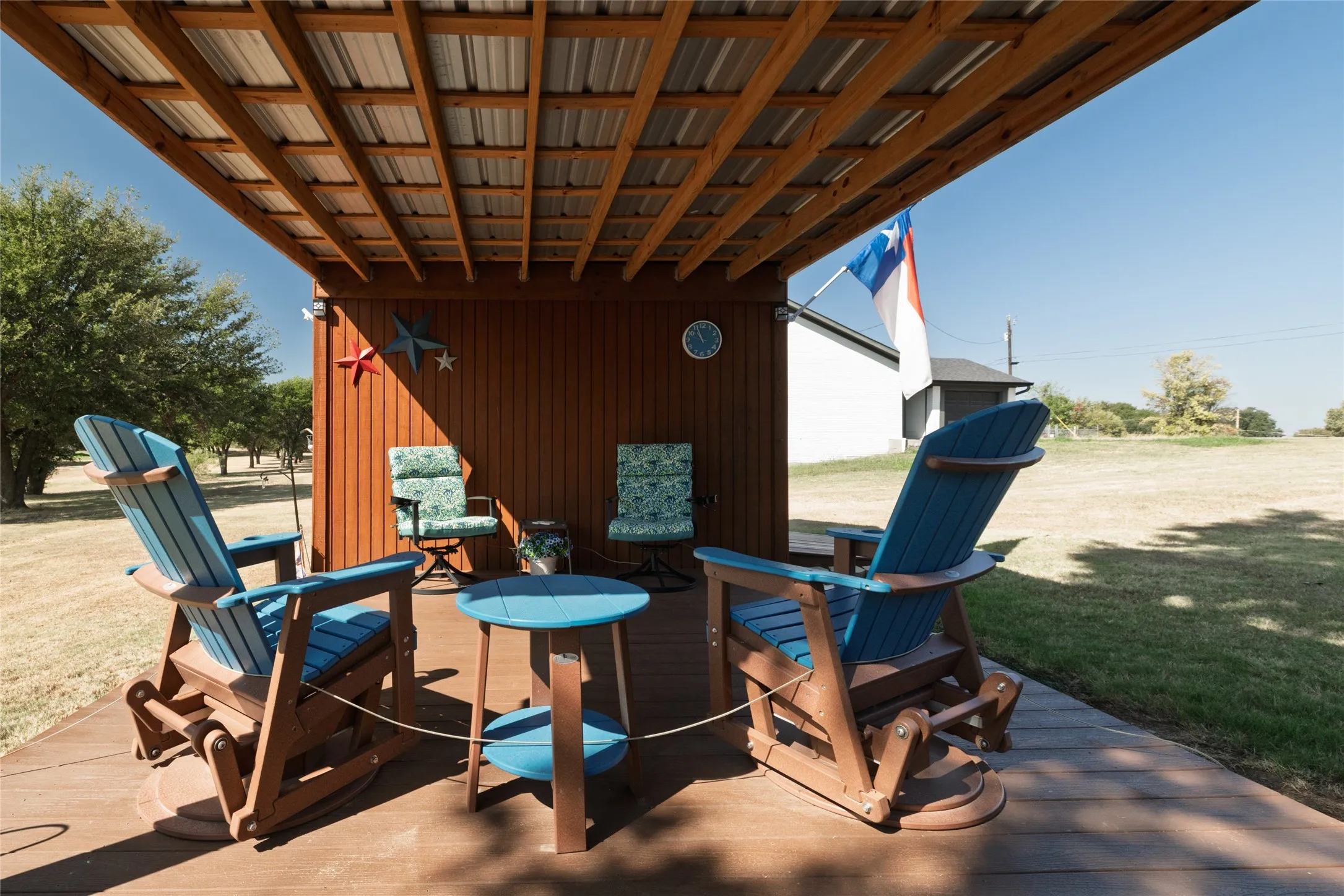 Cedar workshop with covered sitting area.
