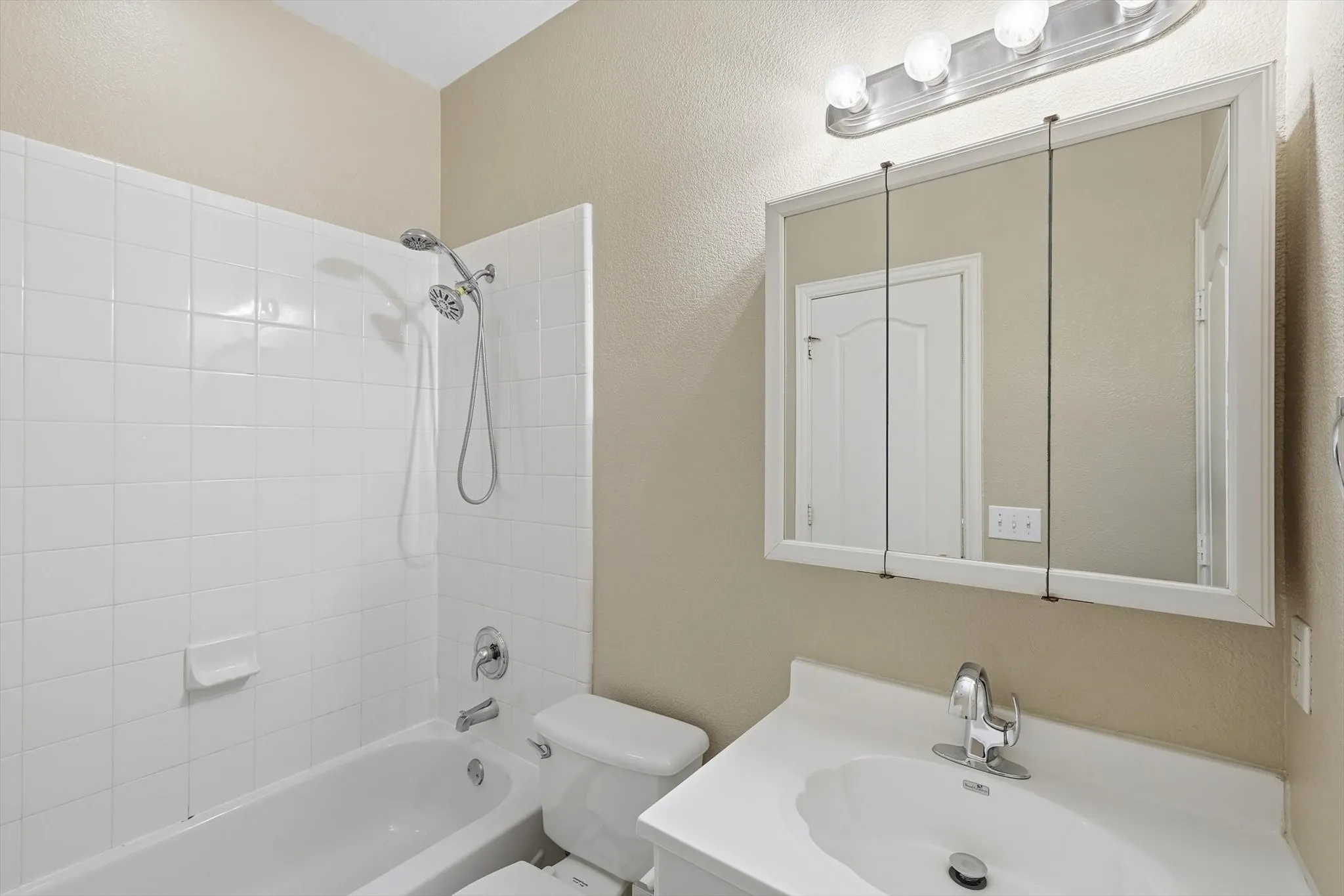 Full Bathroom downstairs attached to the Guest bedroom perfect for parents, in-laws or guests for privacy