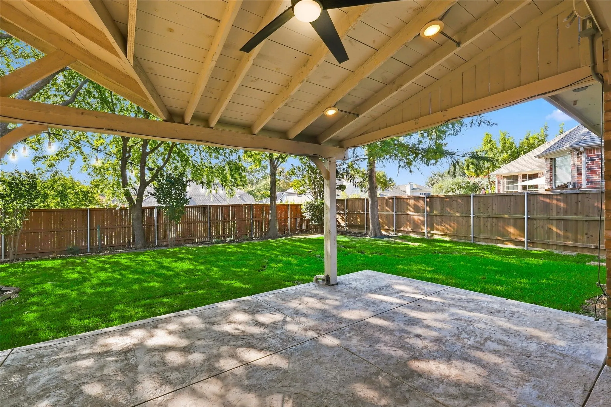 Huge backyard with professionally built covered patio. Brand new grass sodded in Aug 2026