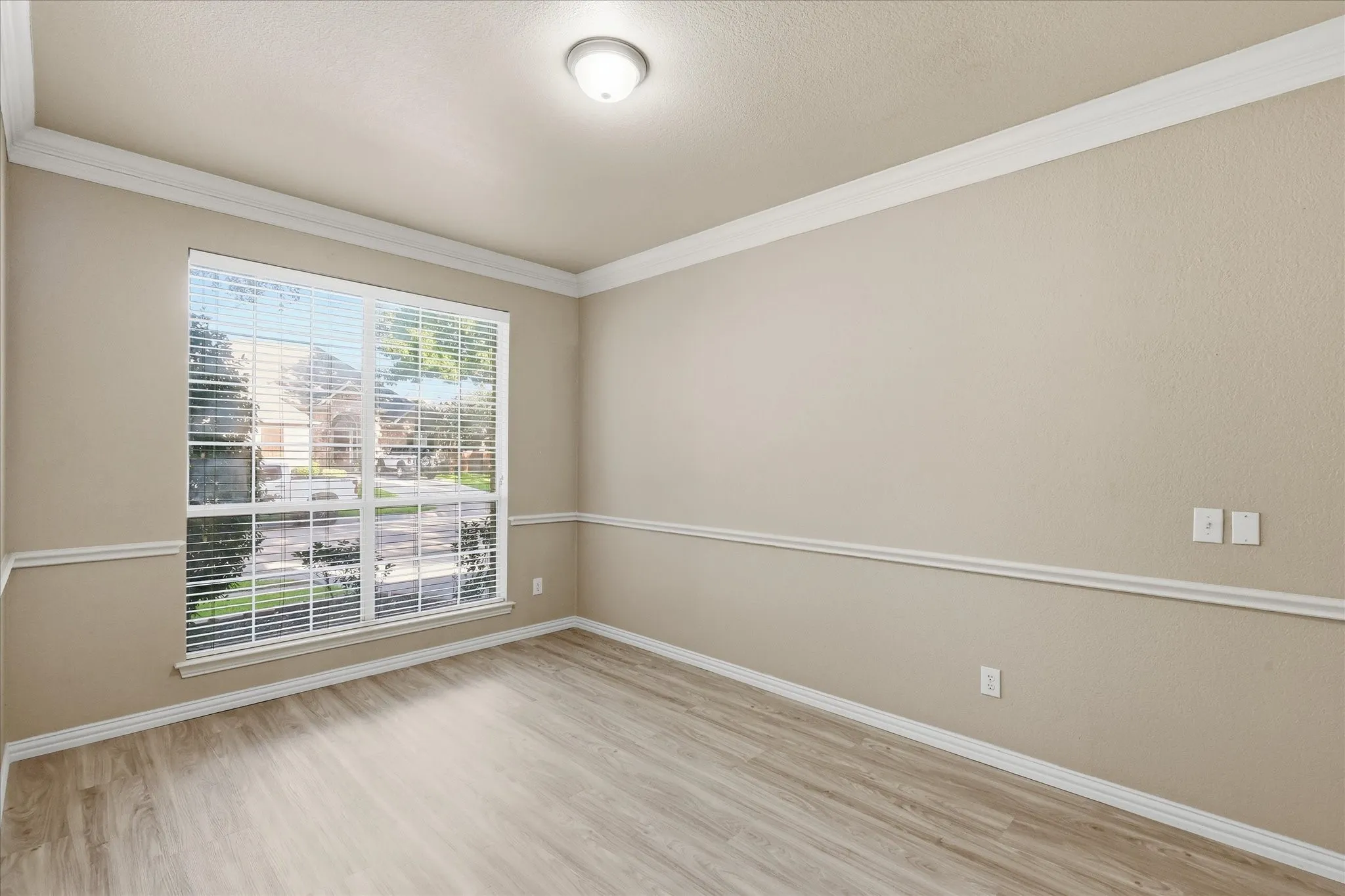 Formal dining room has brand new luxury vinyl flooring installed Aug 2026